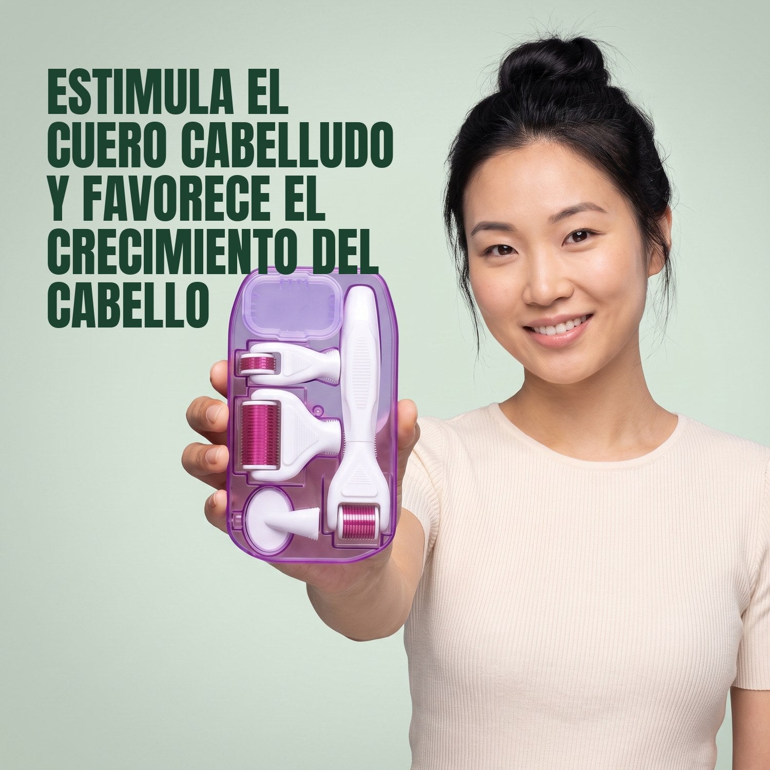Woman holding a 6-in-1 dermaroller kit against a green background
