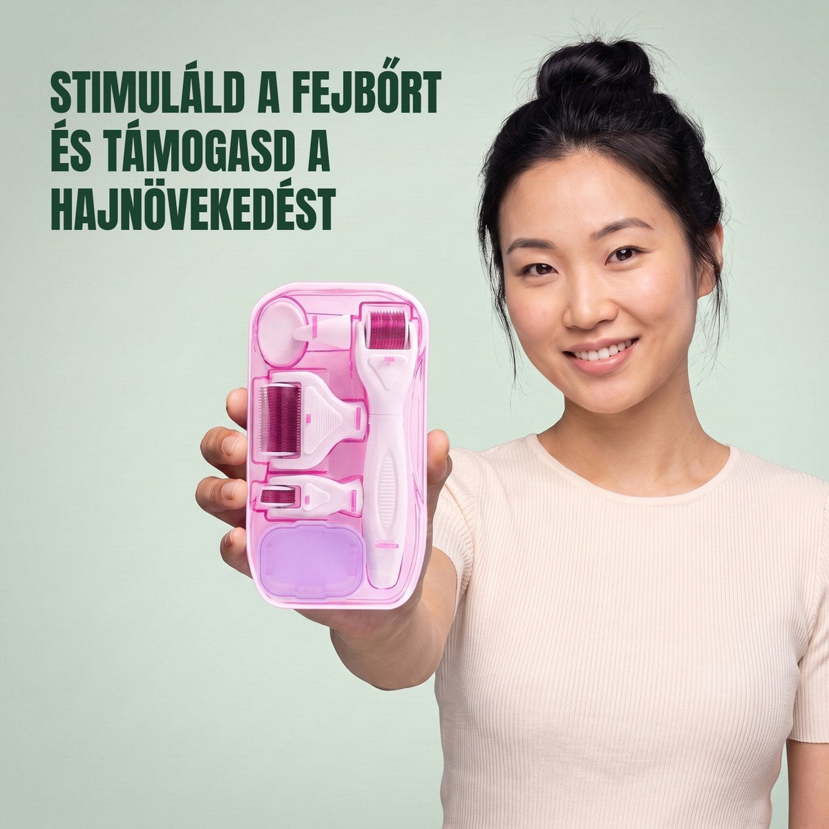 Woman holding the pink 6-in-1 dermaroller kit against a green background