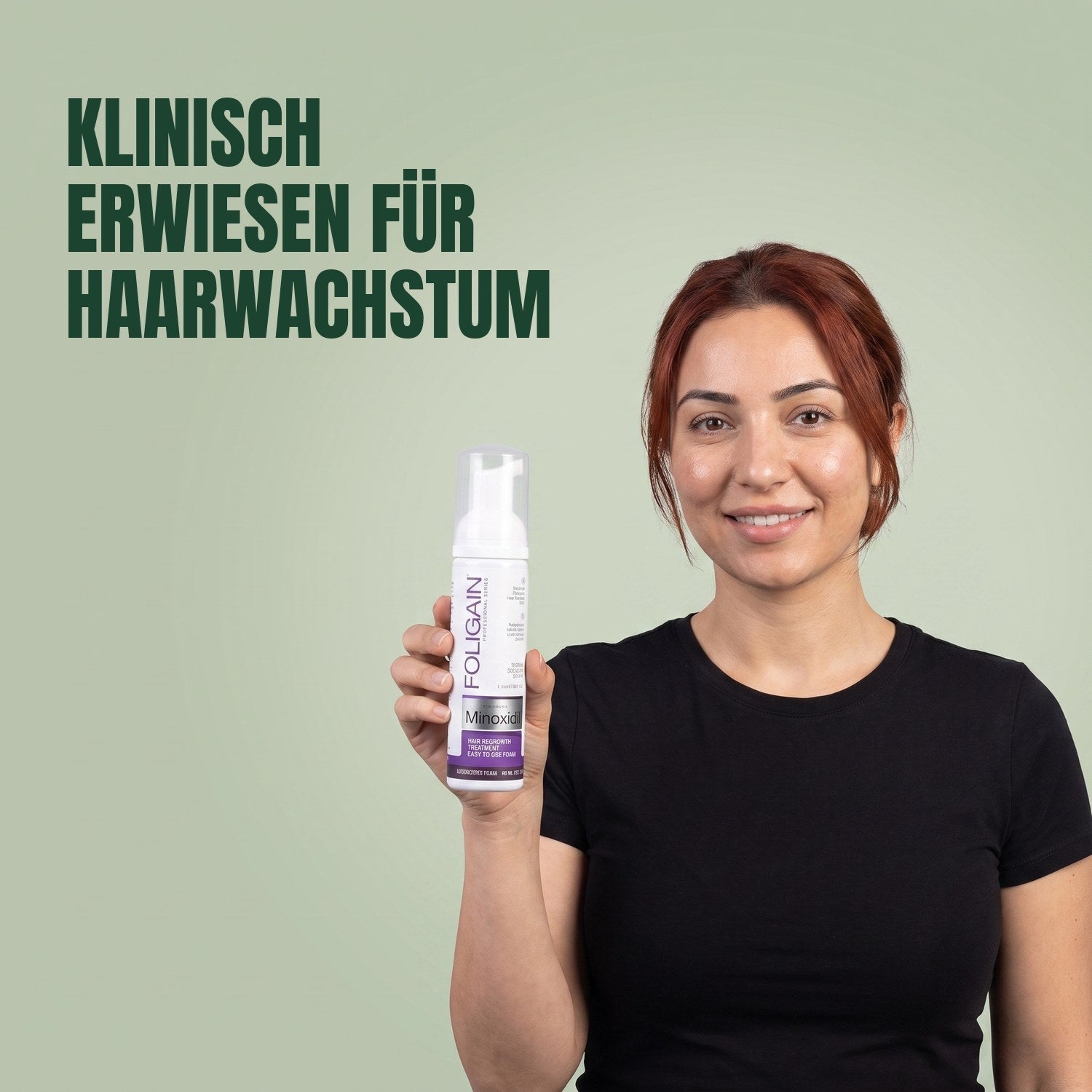 Woman holding the Foligain Minoxidil 2% foam can for women against a green background