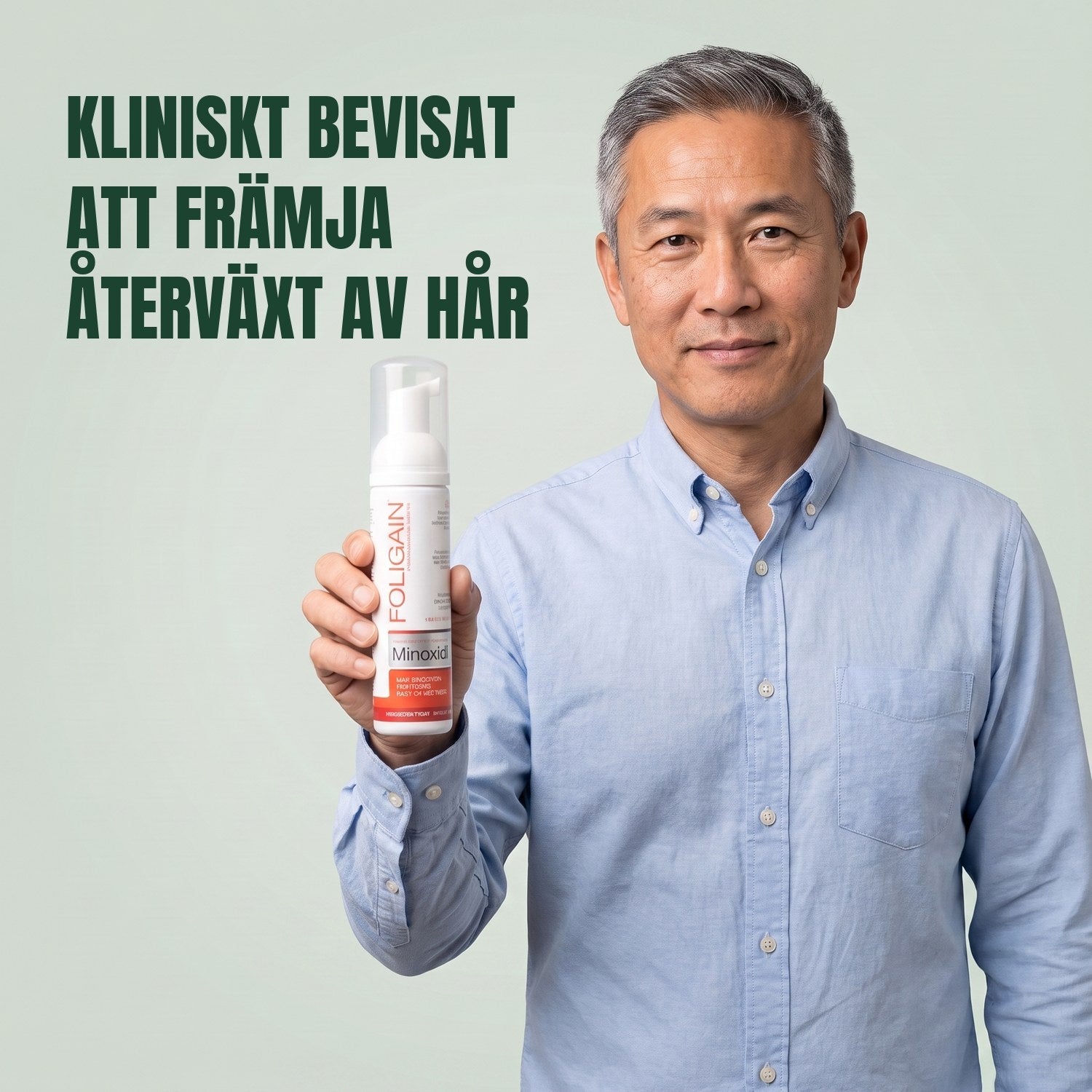 Man holding the Foligain Minoxidil 5% foam can for men against a green background