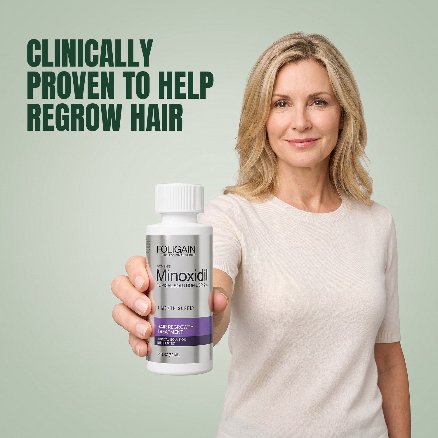 Woman holding a Foligain Minoxidil 2% lotion bottle for women against a green background