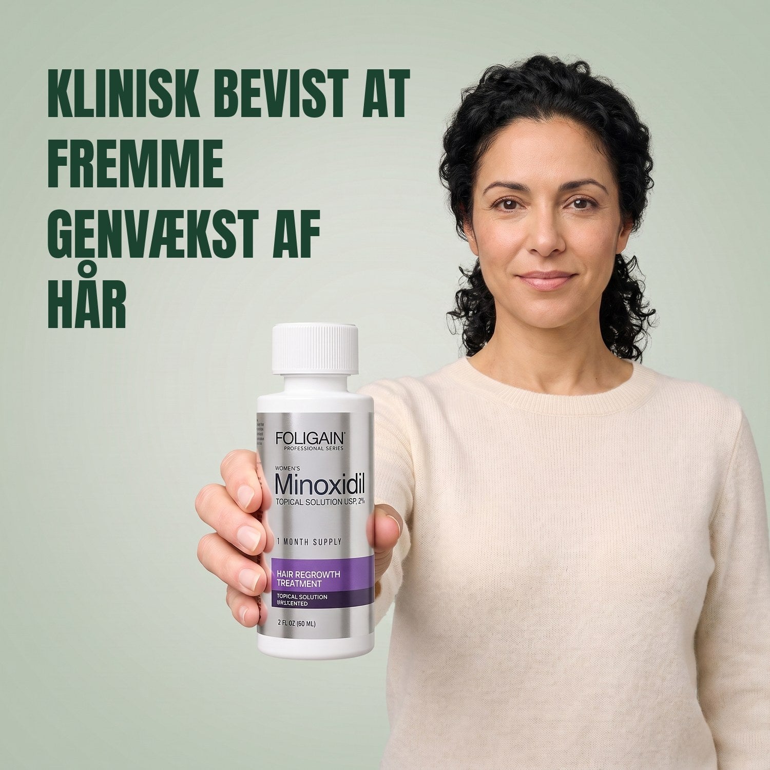 Woman holding the Foligain Minoxidil 2% lotion bottle for women against a green background