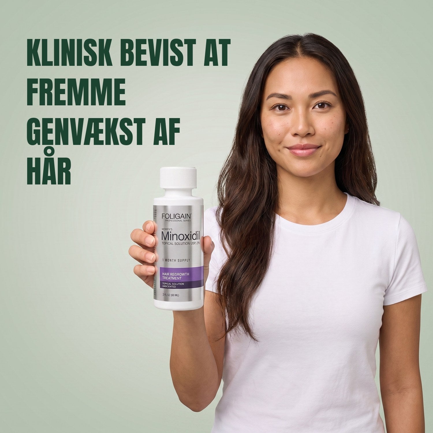 Woman holding the Foligain Minoxidil 2% lotion bottle for women against a green background