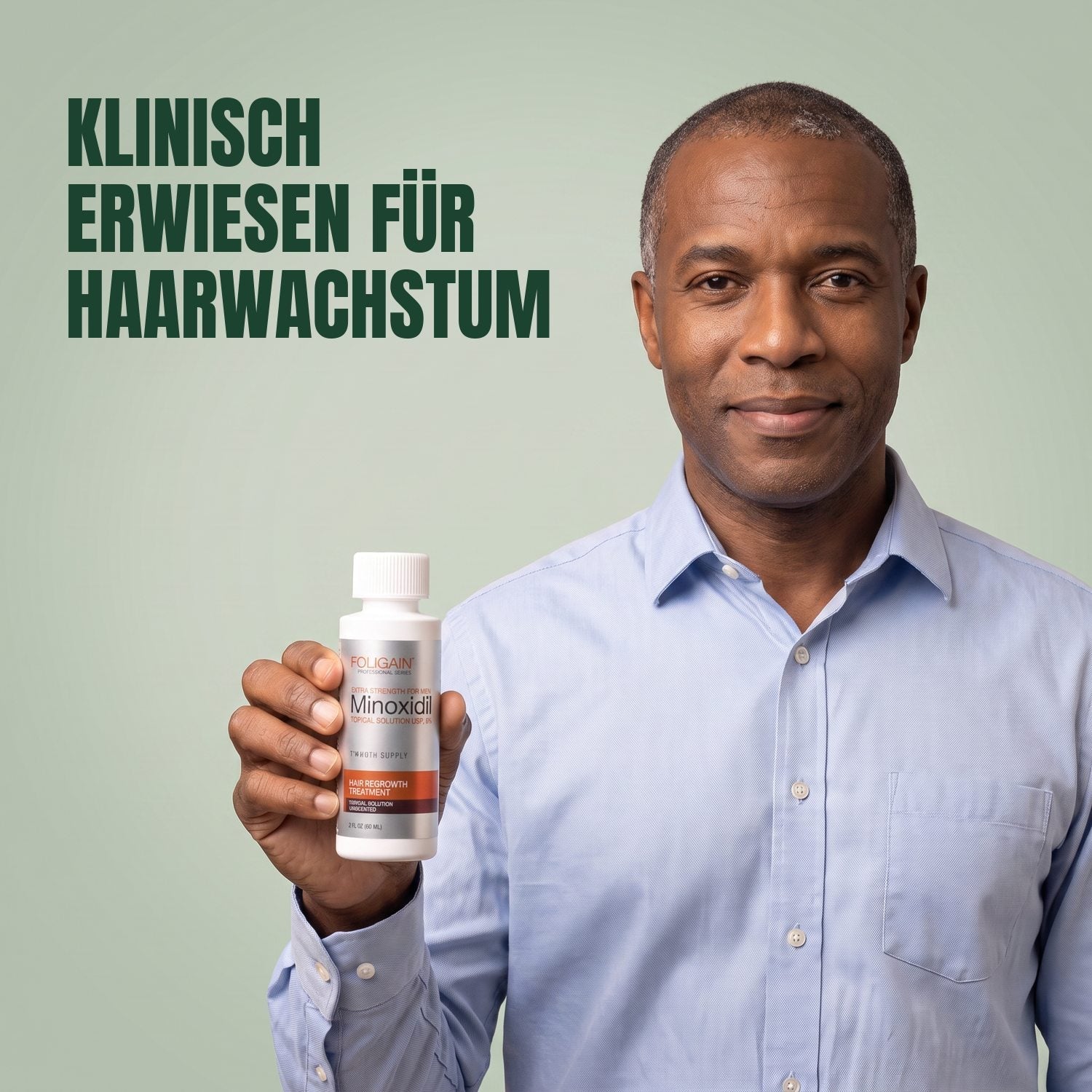 Man holding the Foligain Minoxidil 5% lotion bottle for men against a green background