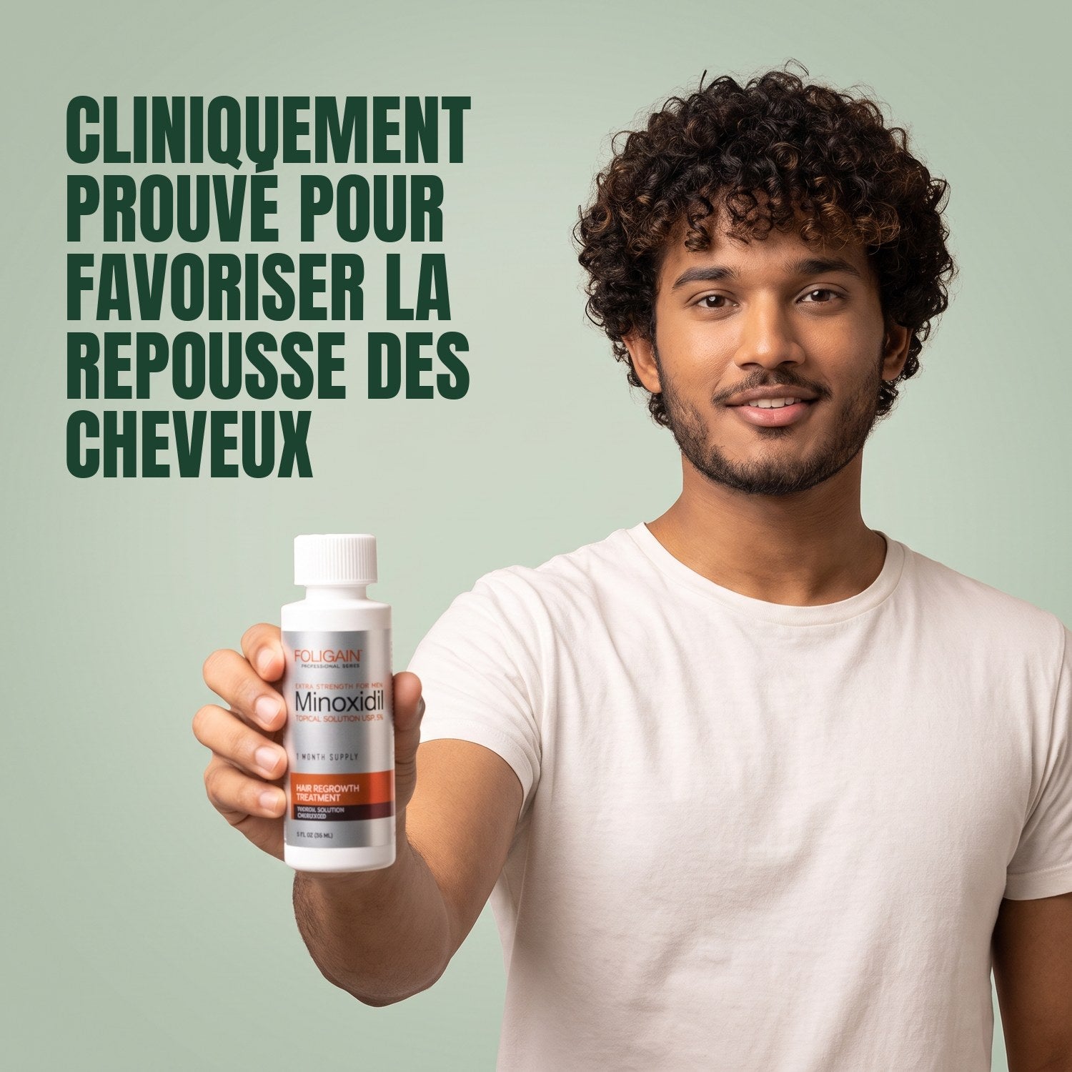 Man holding a Foligain Minoxidil 5% lotion bottle for men against a green background