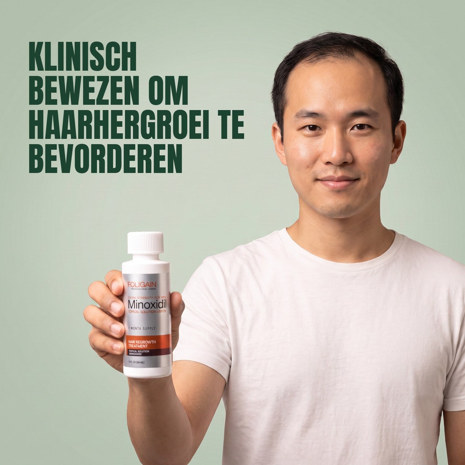 Man holding the Foligain Minoxidil 5% lotion bottle for men against a green background