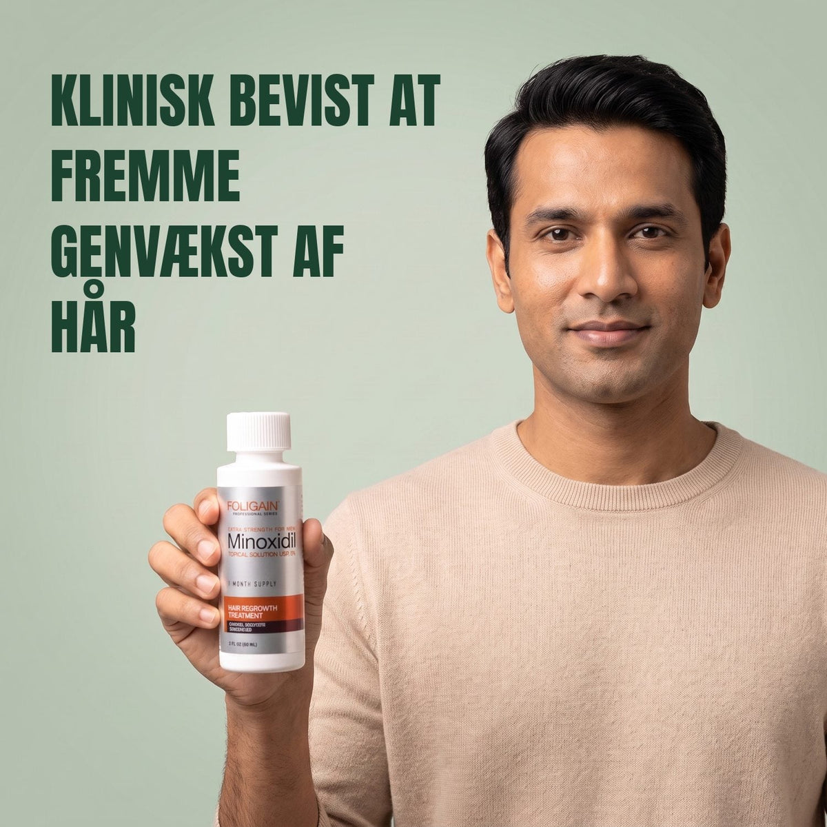 Man holding the Foligain Minoxidil 5% lotion bottle for men against a green background