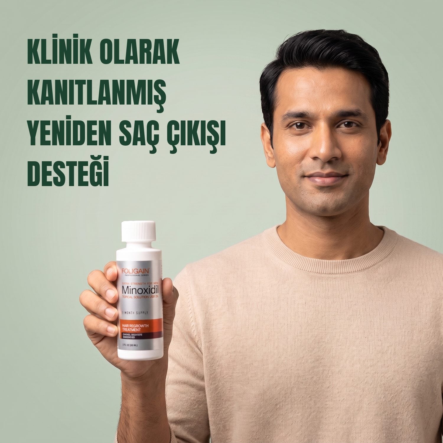 Man holding the Foligain Minoxidil 5% lotion bottle for men against a green background