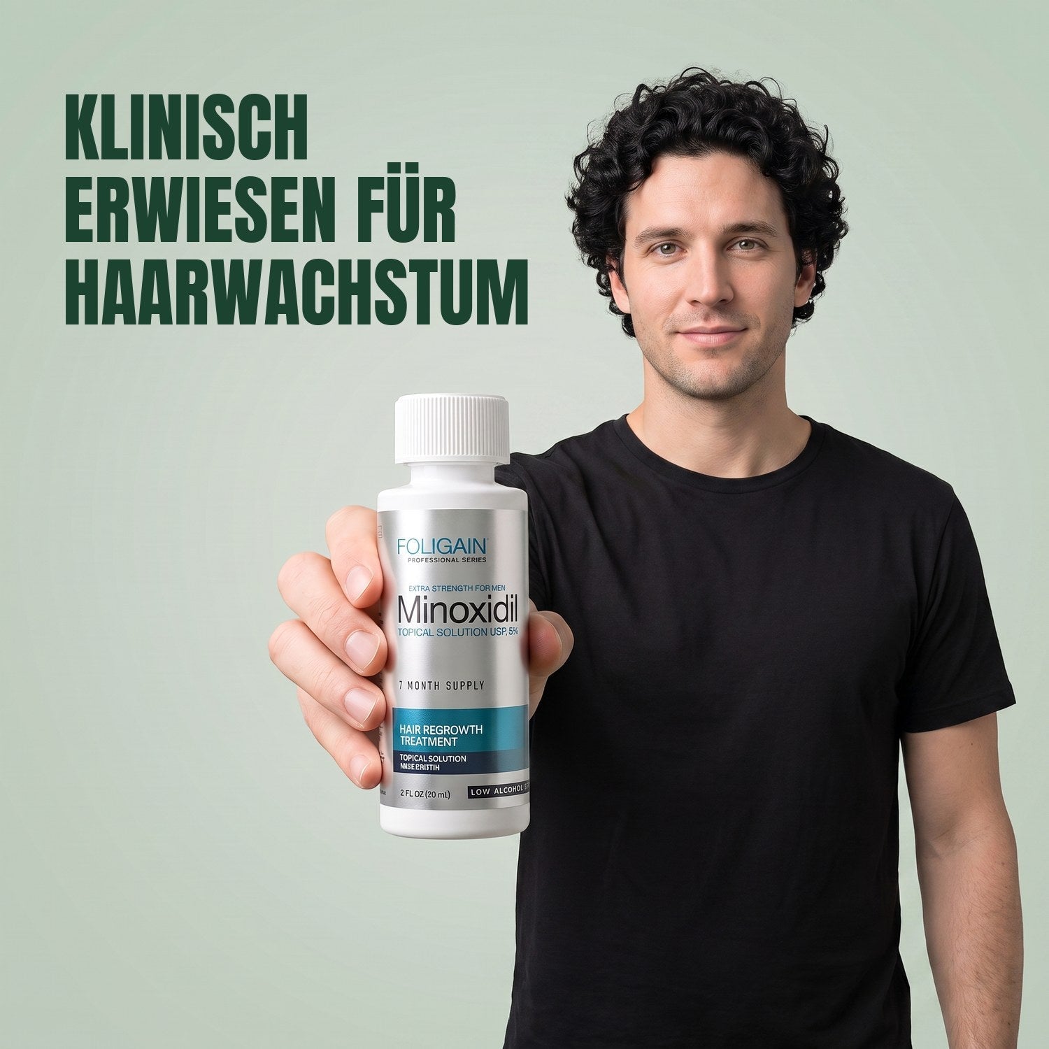 Man holding the Foligain Minoxidil 5% sensitive skin lotion bottle for men against a green background