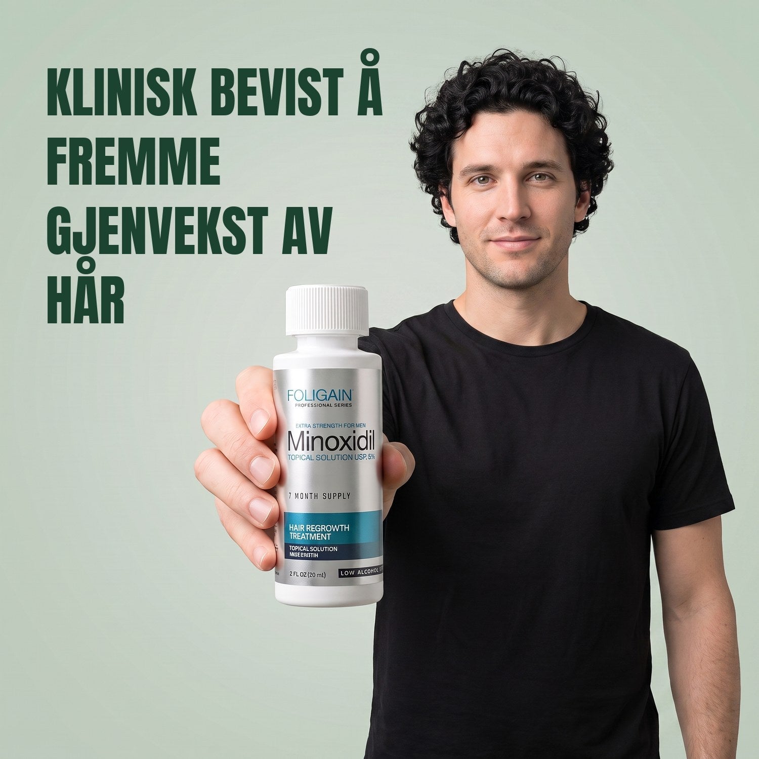 Man holding the Foligain Minoxidil 5% sensitive skin lotion bottle for men against a green background