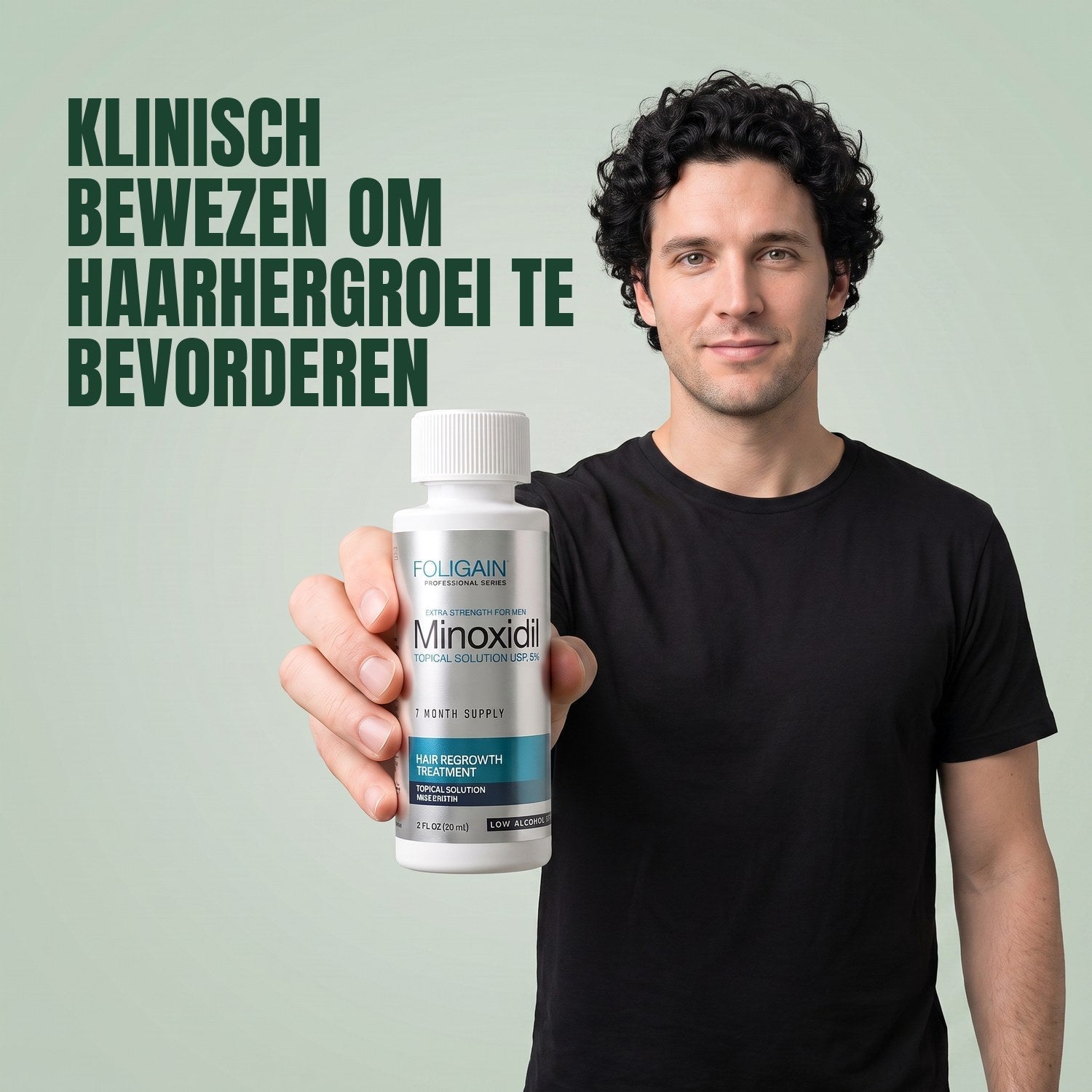 Man holding the Foligain Minoxidil 5% sensitive skin lotion bottle for men against a green background