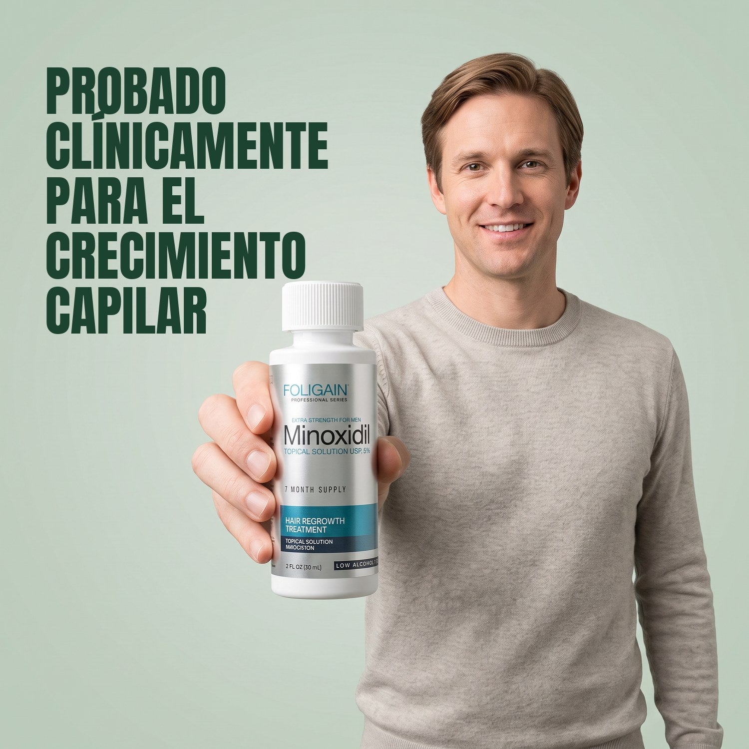 Man holding a Foligain Minoxidil 5% sensitive skin lotion bottle against a green background