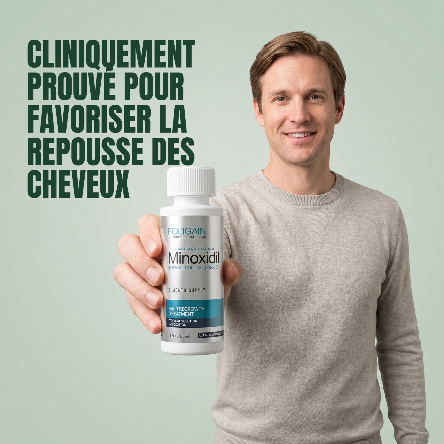 Man holding a Foligain Minoxidil 5% sensitive skin lotion bottle against a green background
