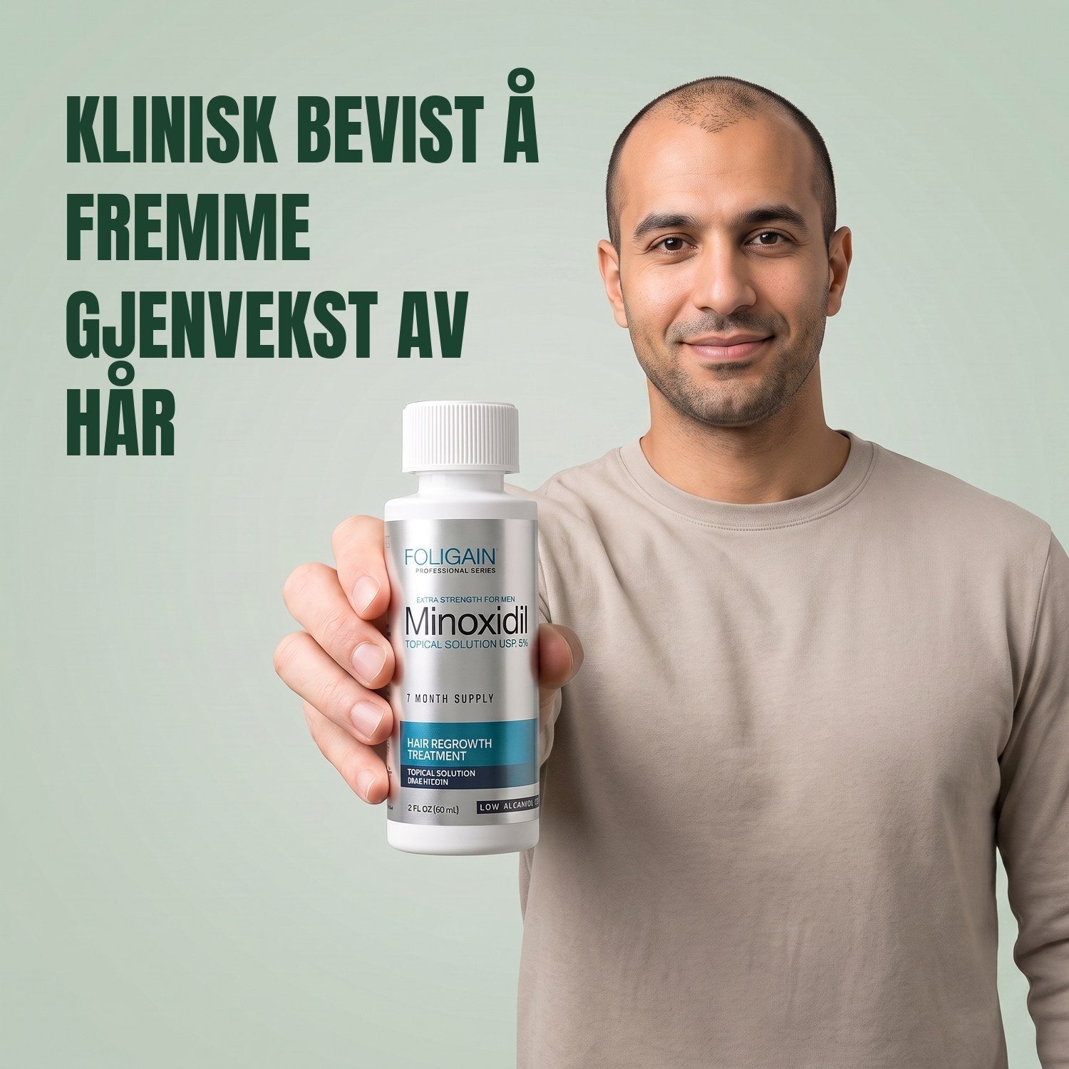 Man holding the Foligain Minoxidil 5% sensitive skin lotion bottle for men against a green background