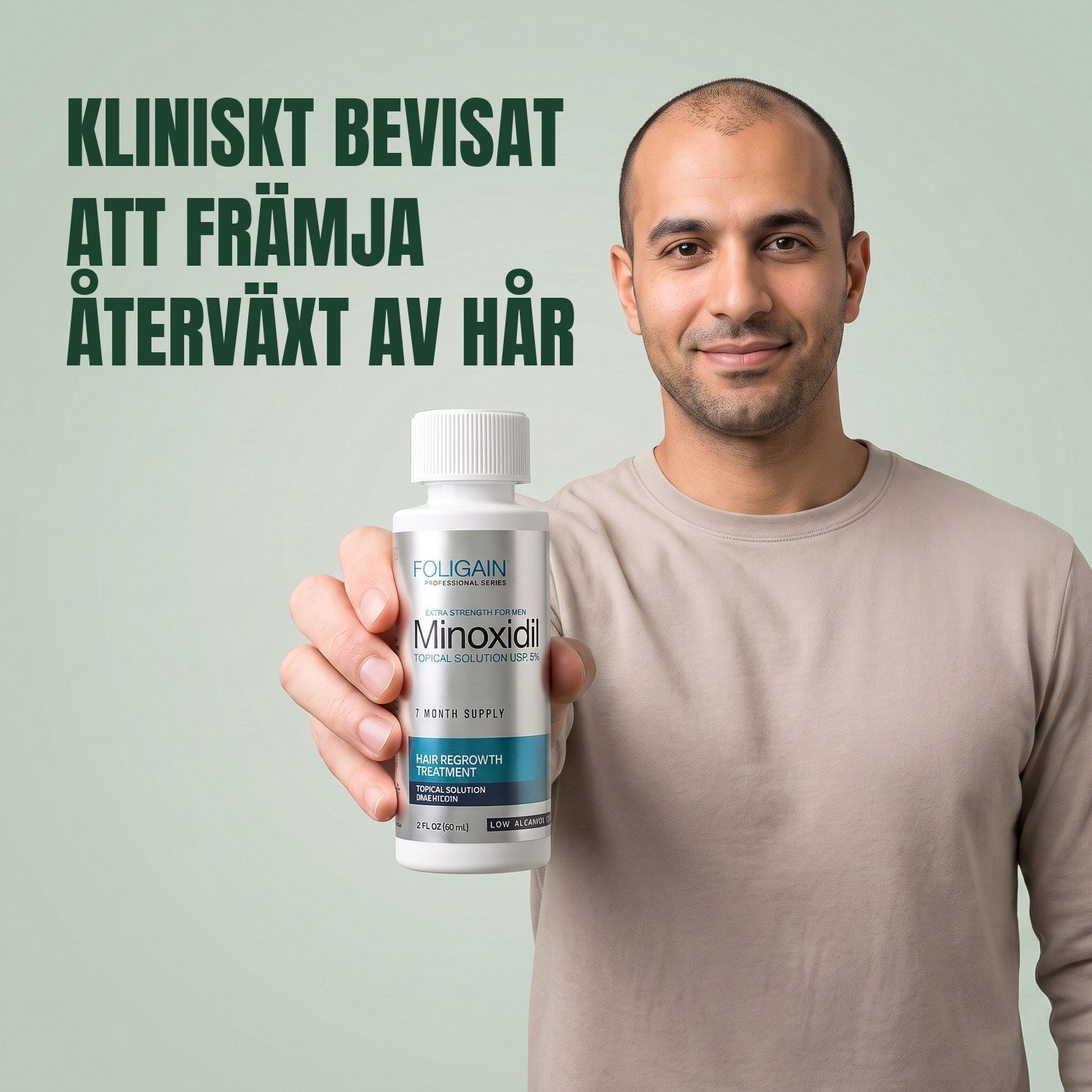 Man holding the Foligain Minoxidil 5% sensitive skin lotion bottle for men against a green background