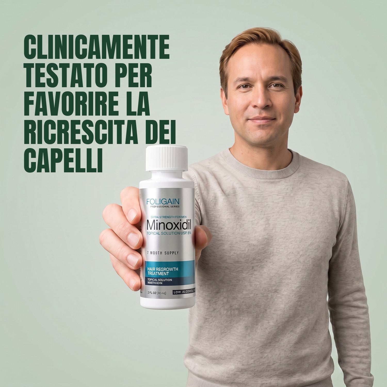 Man holding the Foligain Minoxidil 5% sensitive skin lotion bottle for men against a green background