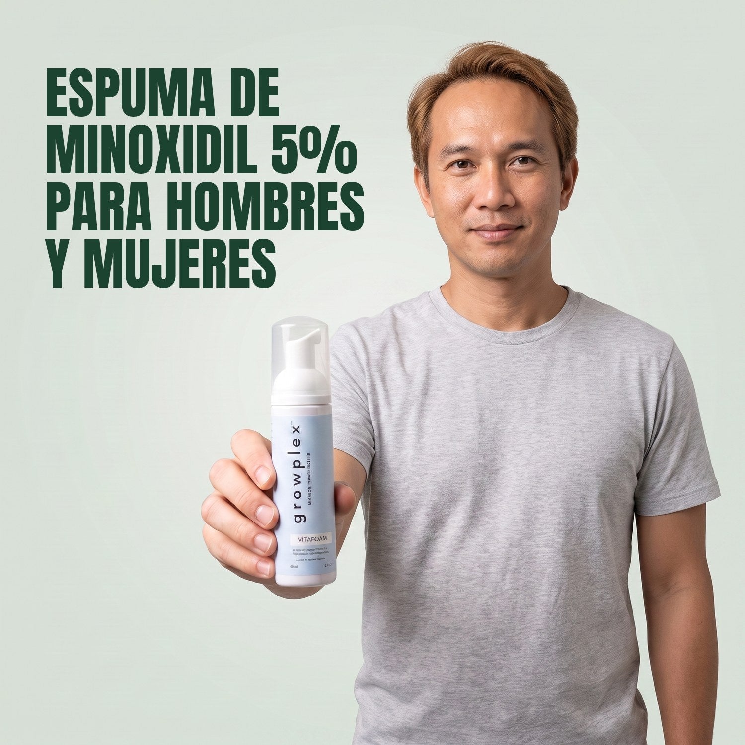 Man holding the Growplex VitaFoam minoxidil 5% foam bottle against a green background