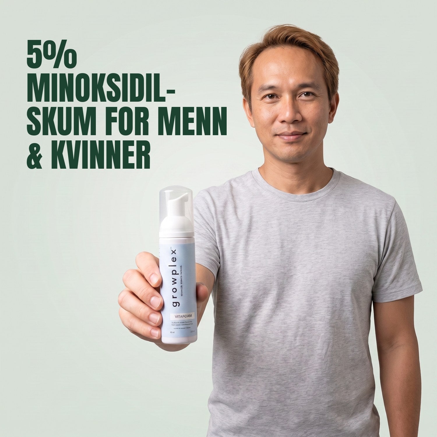 Man holding the Growplex VitaFoam minoxidil 5% foam bottle against a green background
