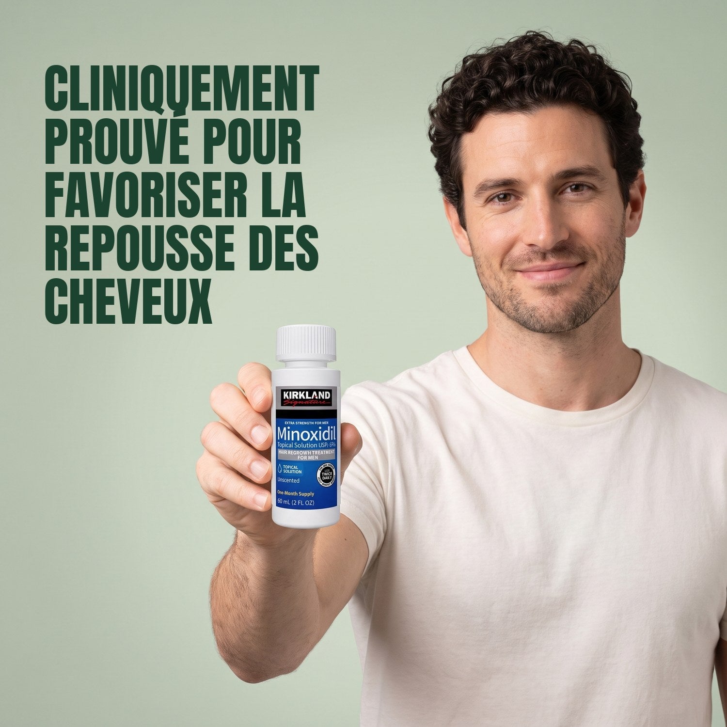 Man holding a Kirkland Signature Minoxidil 5% lotion bottle against a green background
