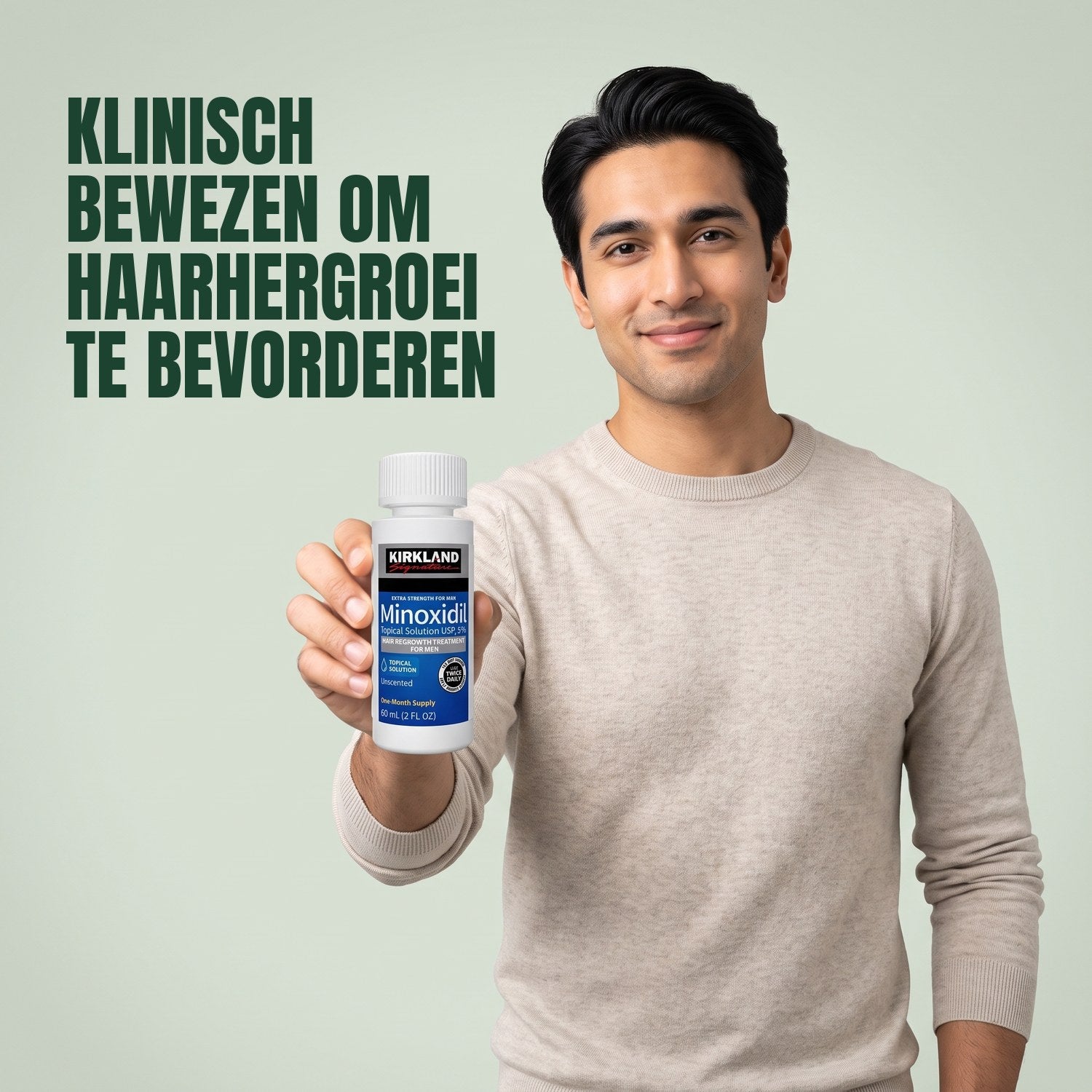 Man holding a Kirkland Signature Minoxidil 5% lotion bottle against a green background