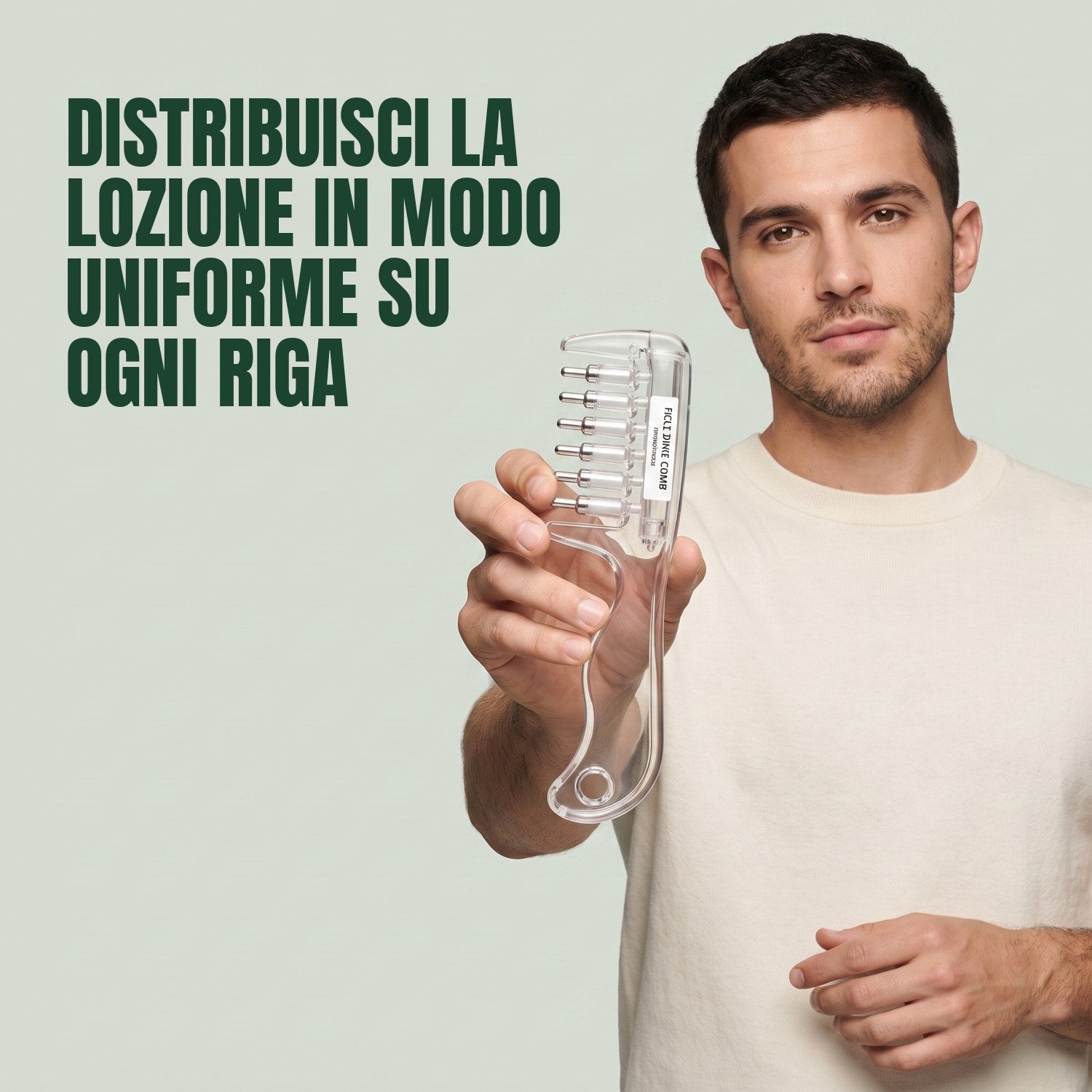Man holding the minoxidil applicator comb against a green background
