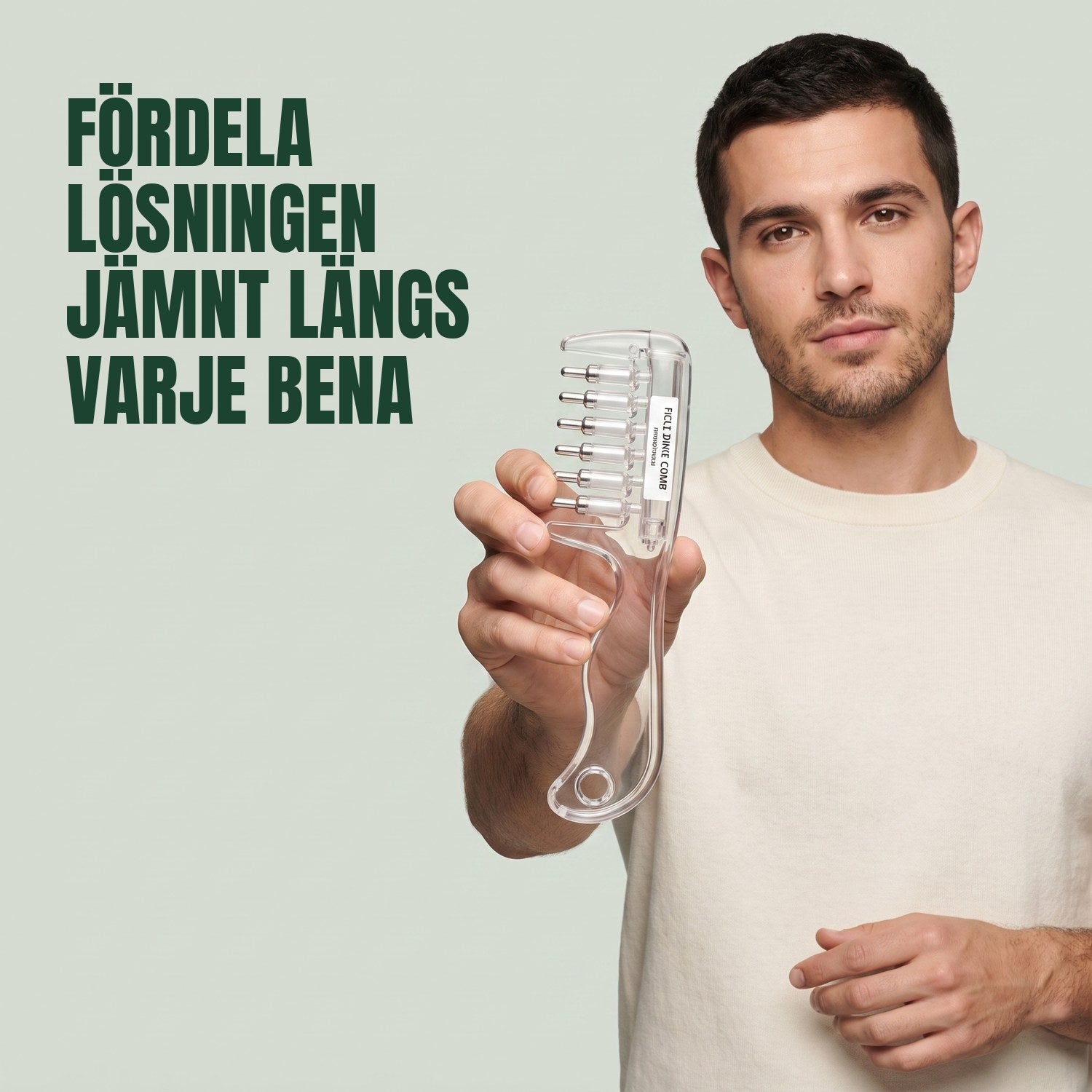 Man som håller minoxidil-applikatorkammen mot en grön bakgrund