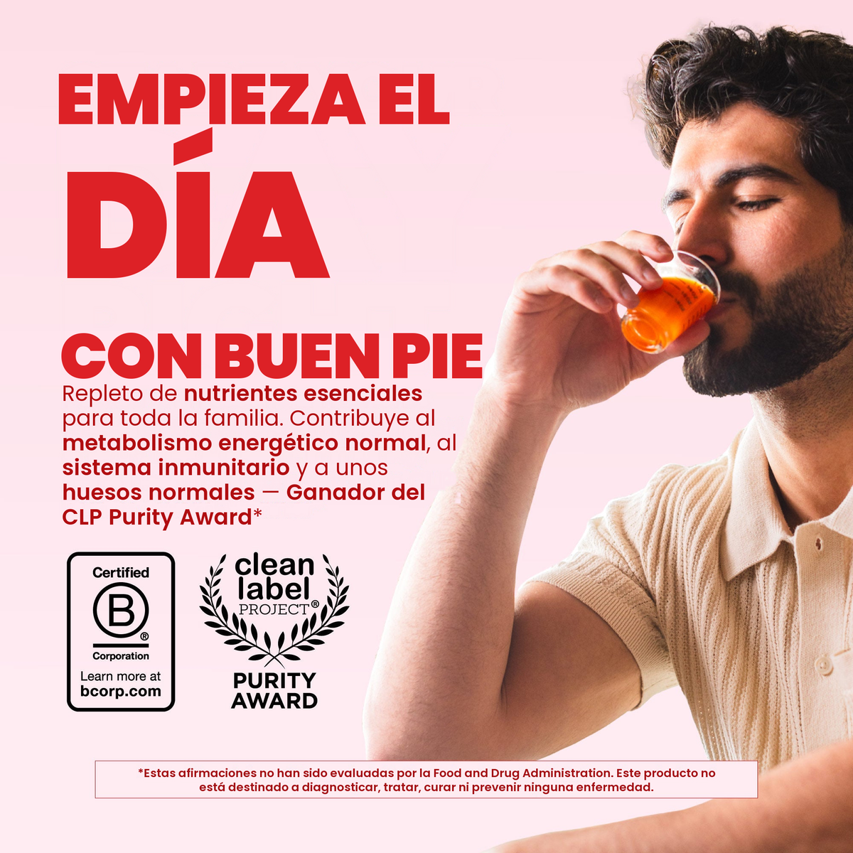 Hombre bebiendo el Liquid Morning Multivitamin de frambuesa, con los sellos Certified B Corporation y Clean Label Project Purity Award