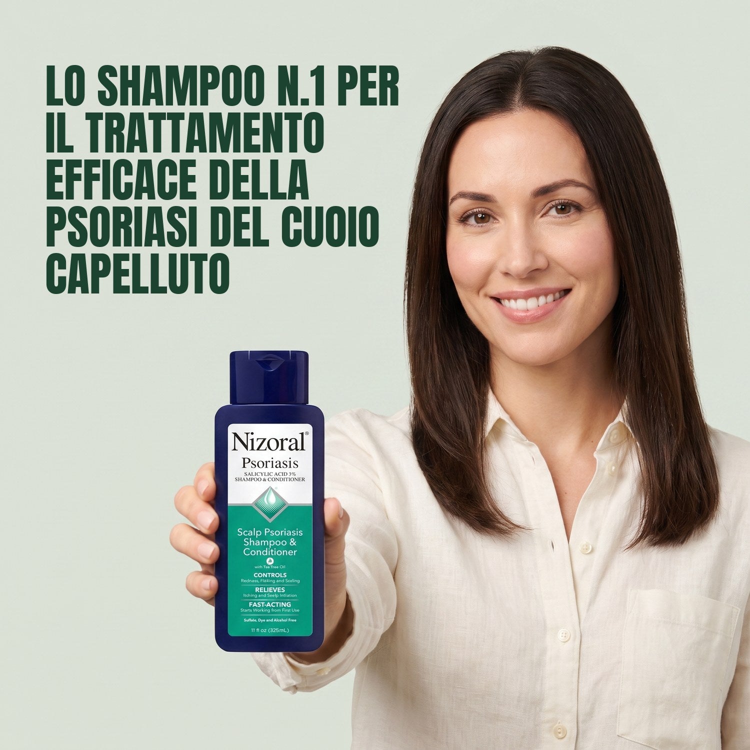 Woman holding Nizoral scalp psoriasis shampoo and conditioner against a green background