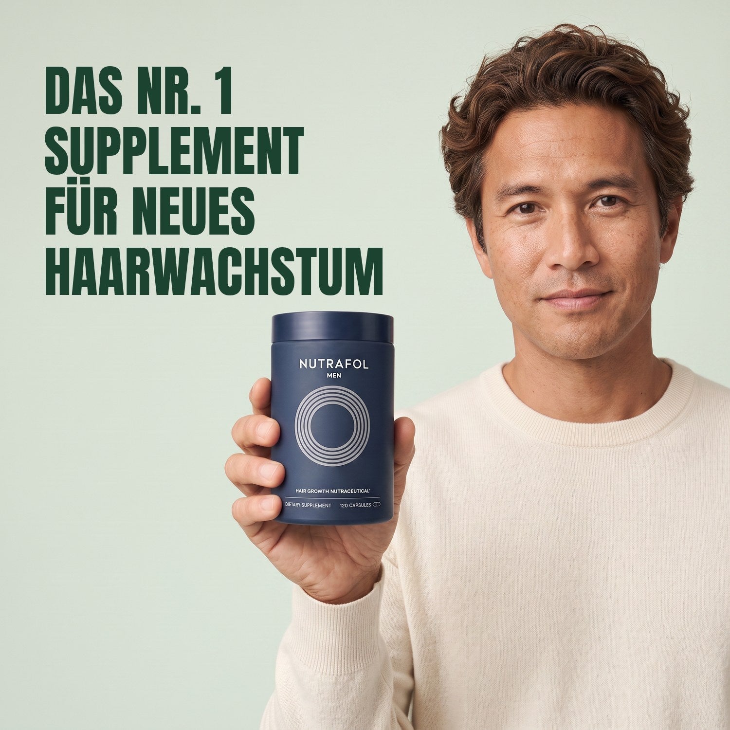 Man holding the Nutrafol for Men supplement box against a green background