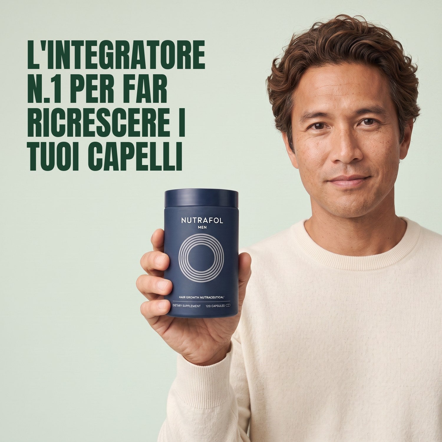Man holding the Nutrafol for Men supplement box against a green background