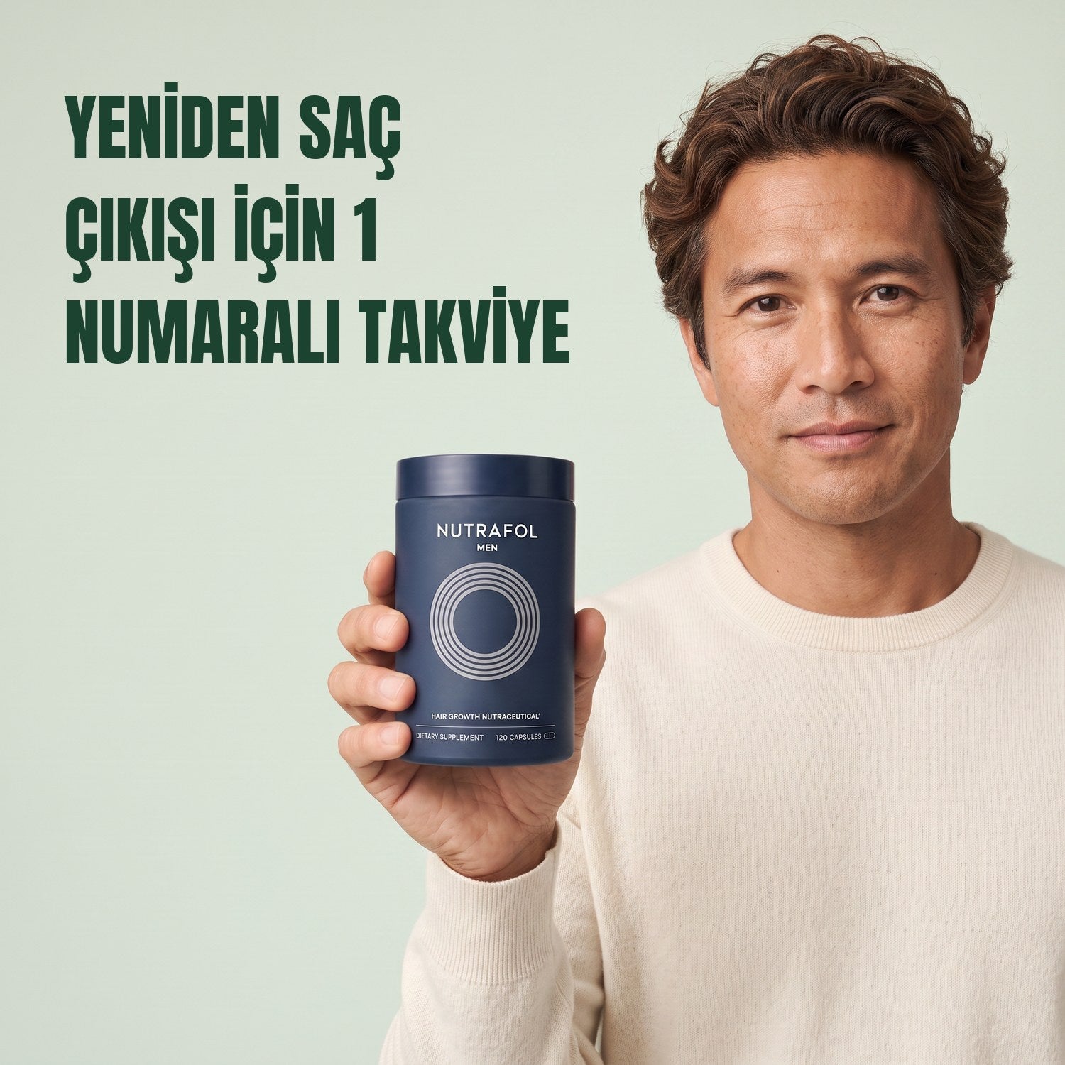 Man holding the Nutrafol for Men supplement box against a green background