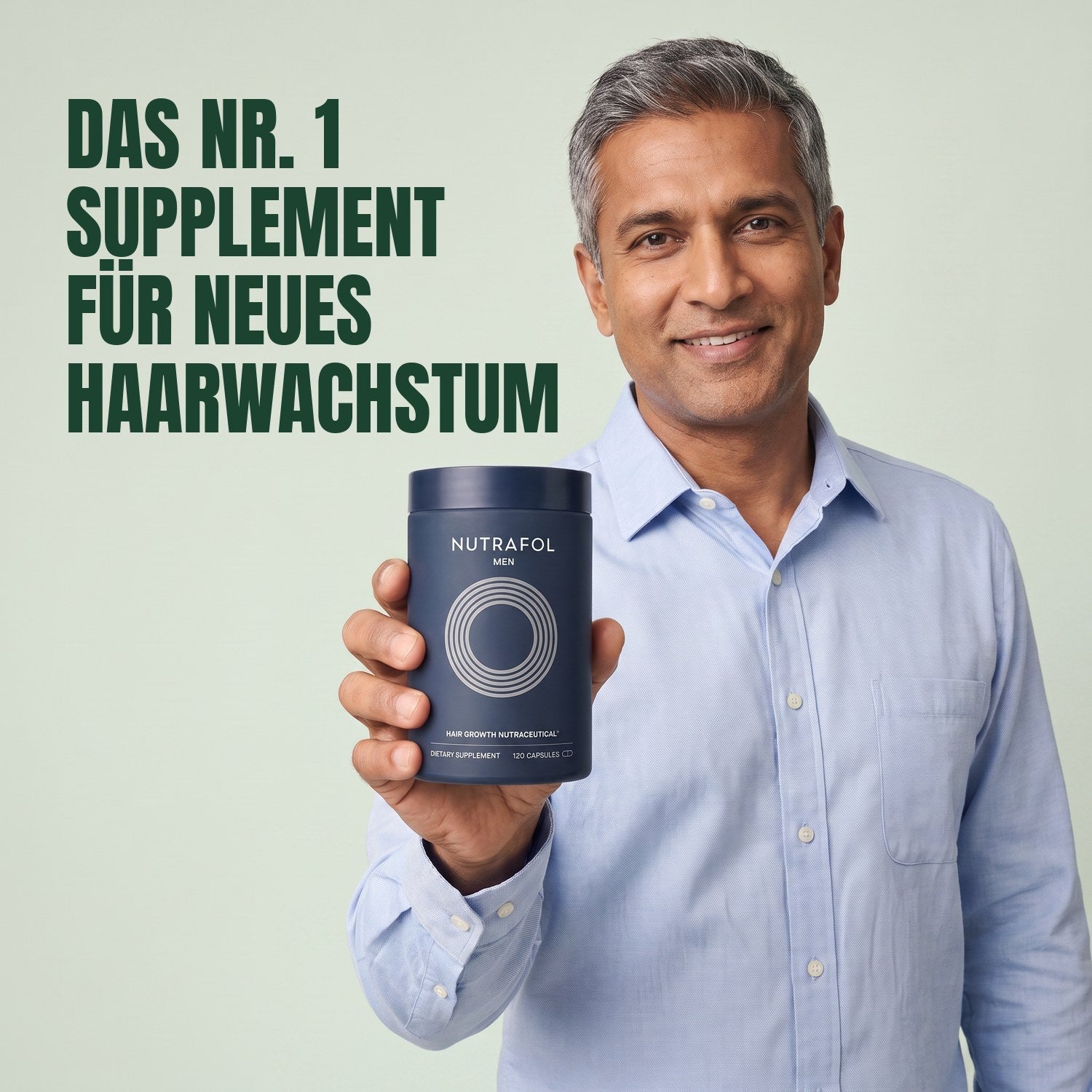 Man holding the Nutrafol for Men supplement box against a green background