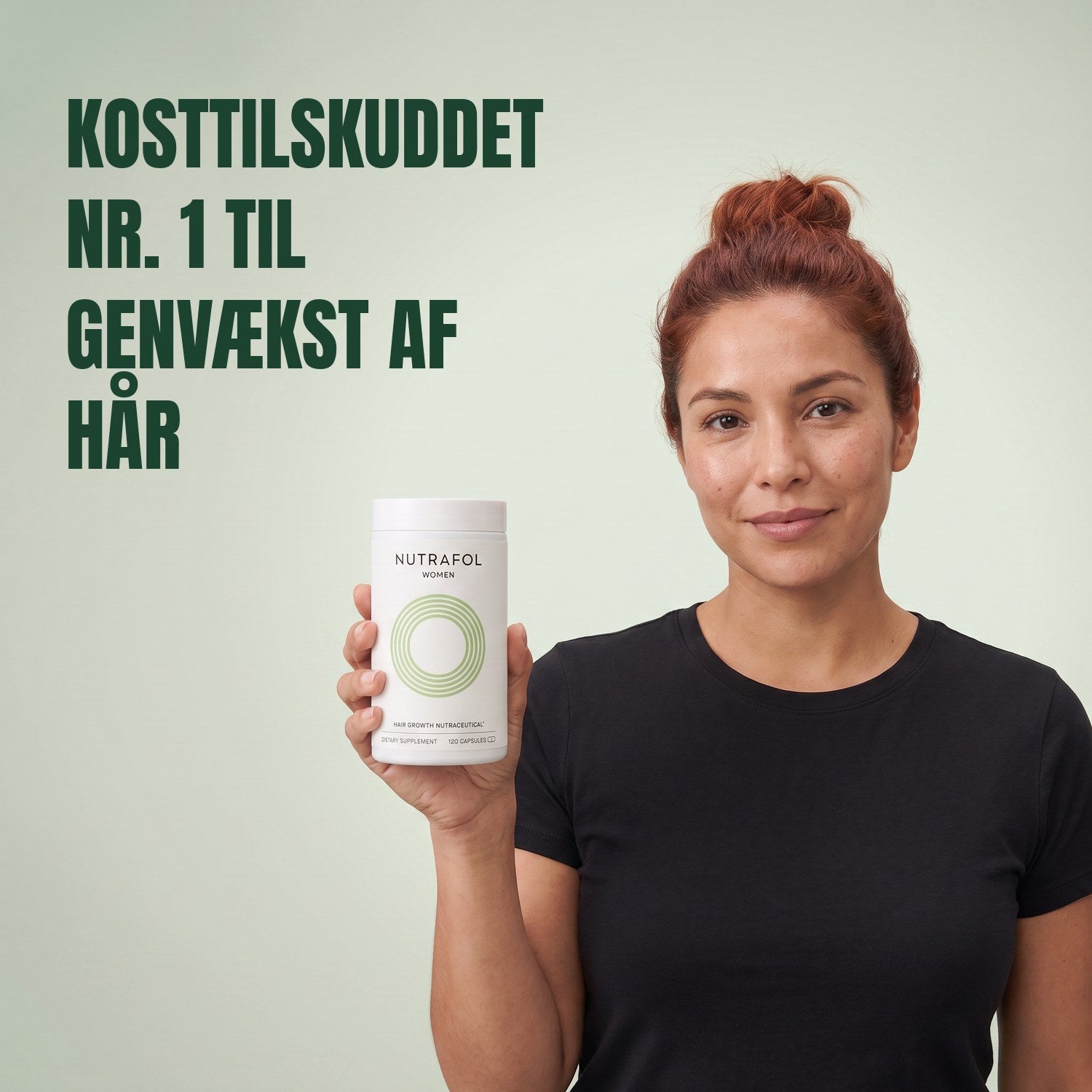 Woman holding the Nutrafol for Women 18-44 supplement box against a green background