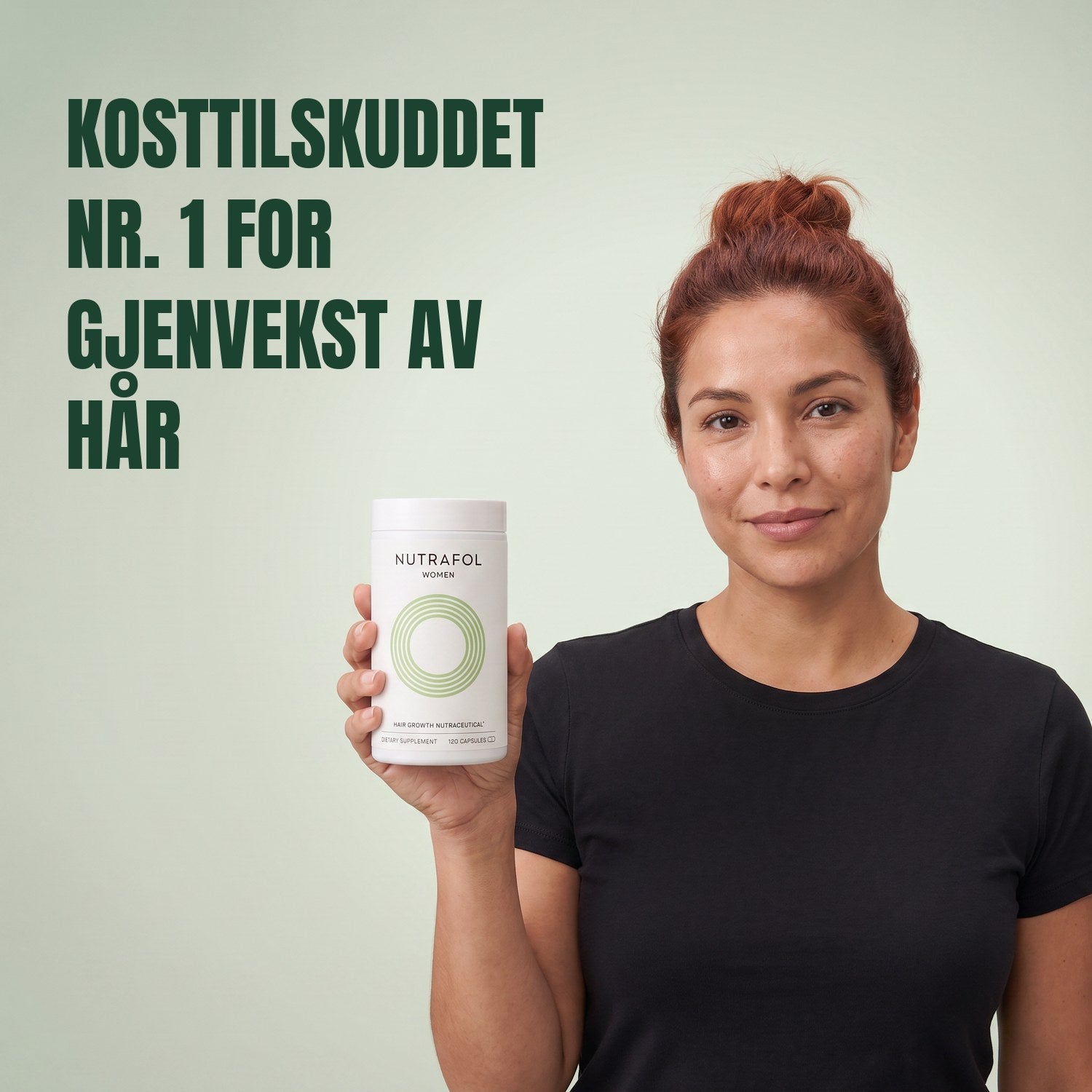 Woman holding the Nutrafol for Women 18-44 supplement box against a green background
