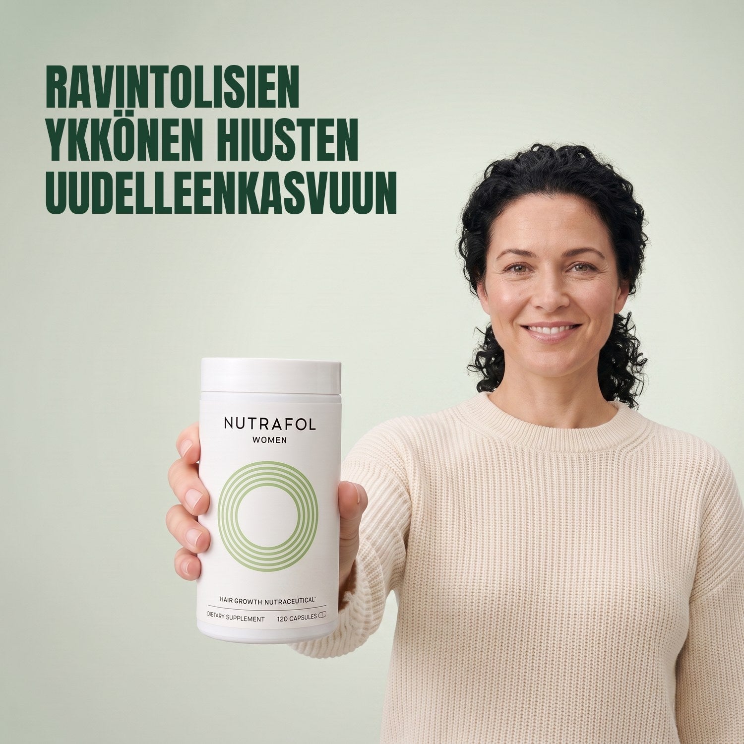 Woman holding the Nutrafol for Women 18-44 supplement box against a green background