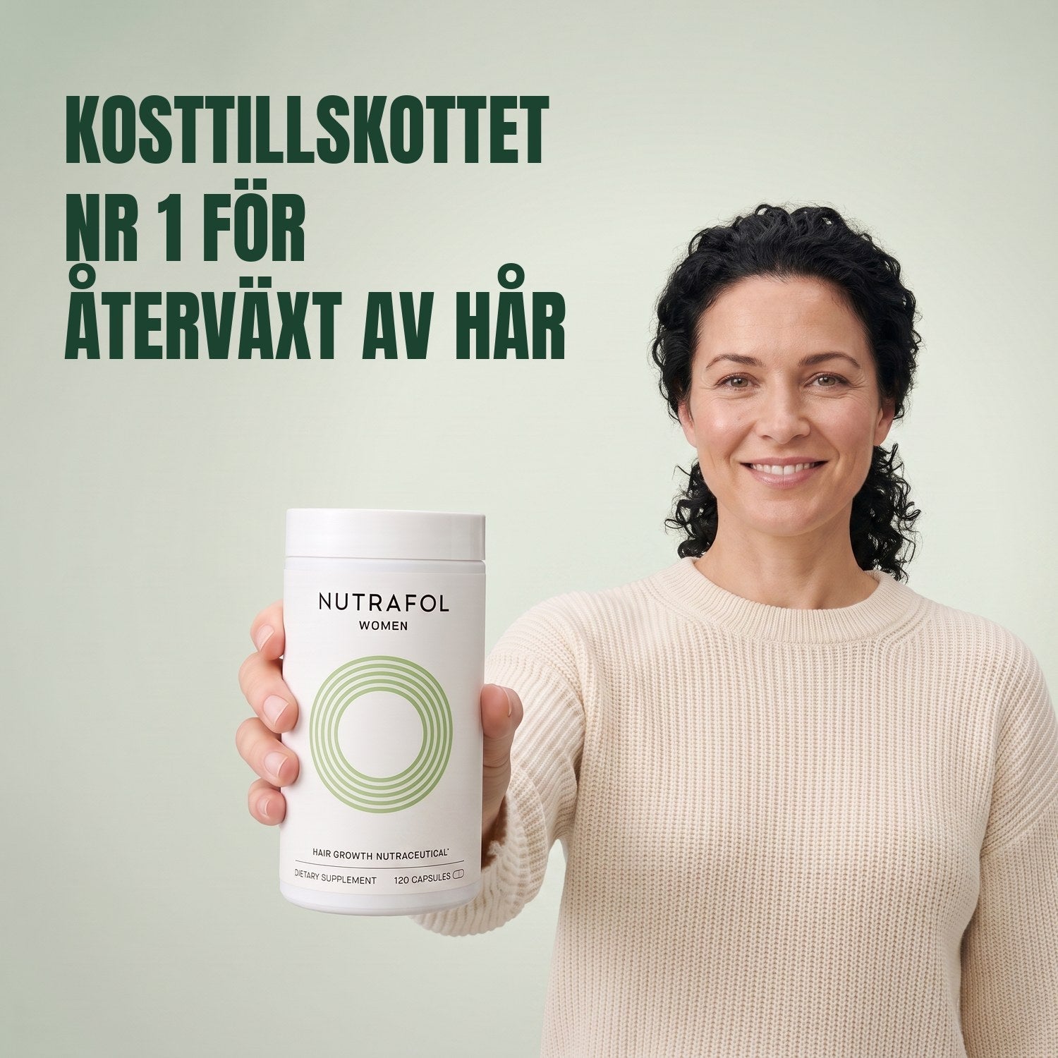 Woman holding the Nutrafol for Women 18-44 supplement box against a green background