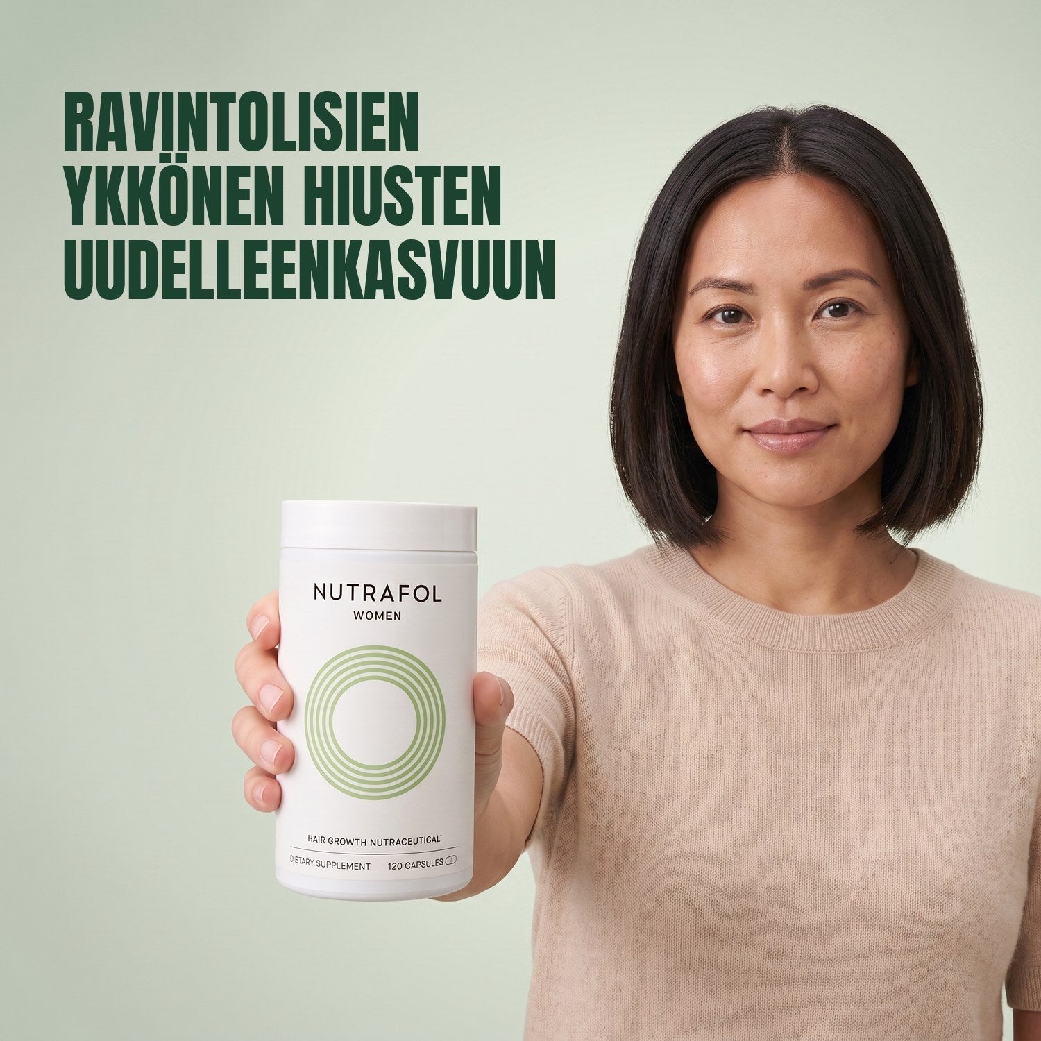 Woman holding the Nutrafol for Women 18-44 supplement box against a green background