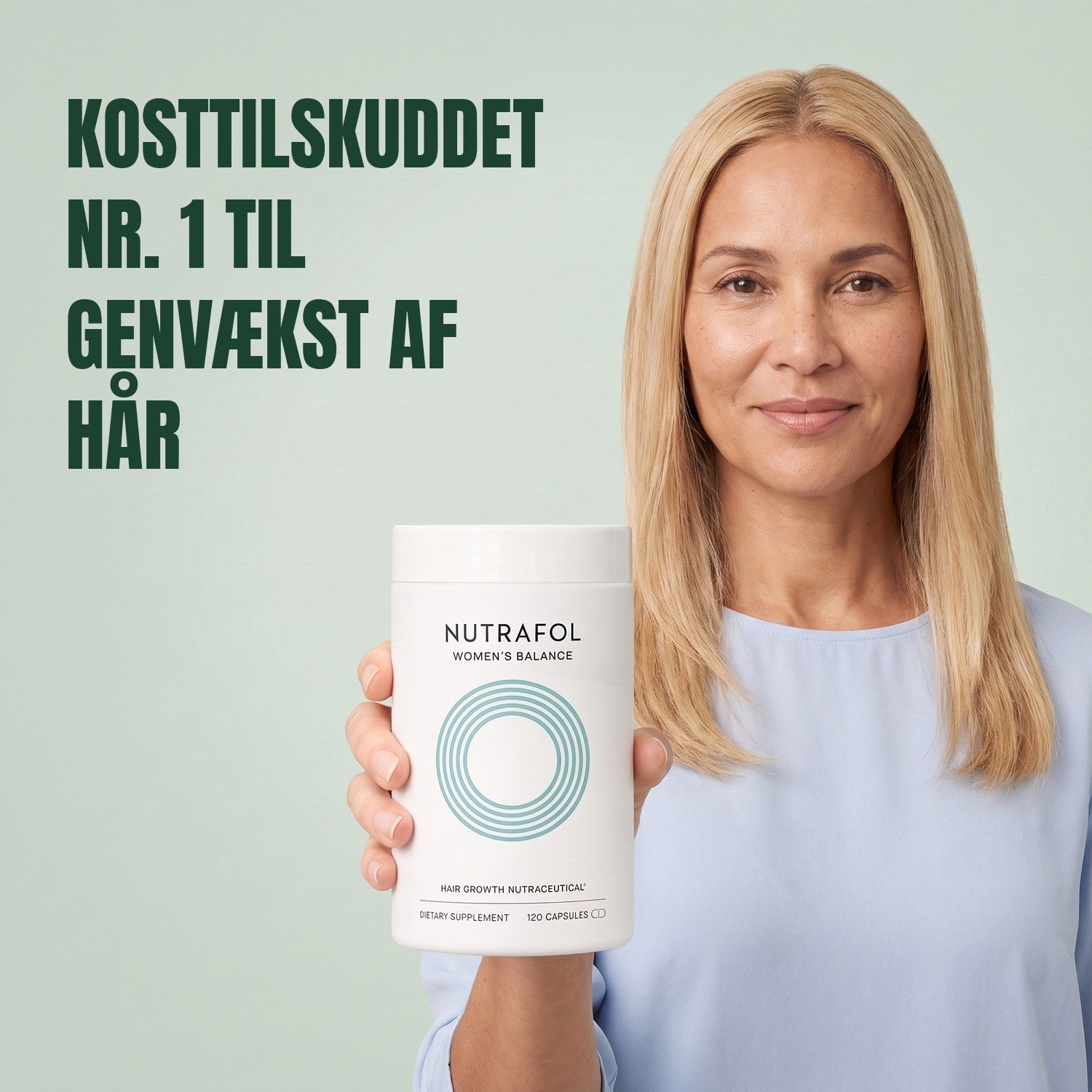 Woman holding the Nutrafol for Women 45+ supplement box against a green background
