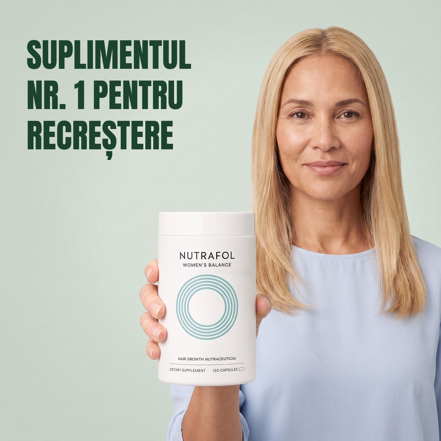 Femeie ținând în mână cutia de suplimente Nutrafol for Women 45+, pe fundal verde