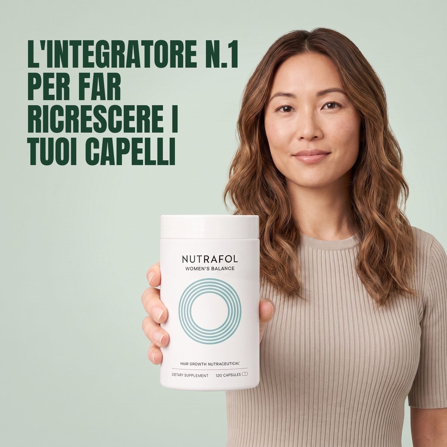 Woman holding the Nutrafol for Women 45+ supplement box against a green background