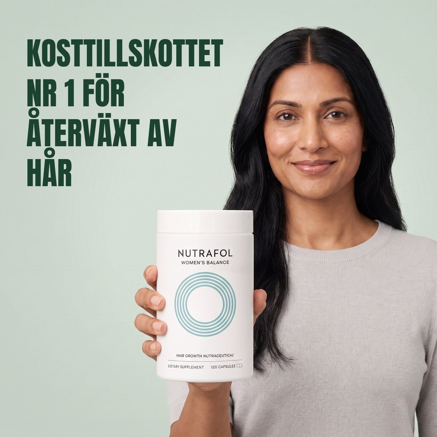 Woman holding the Nutrafol for Women 45+ supplement box against a green background