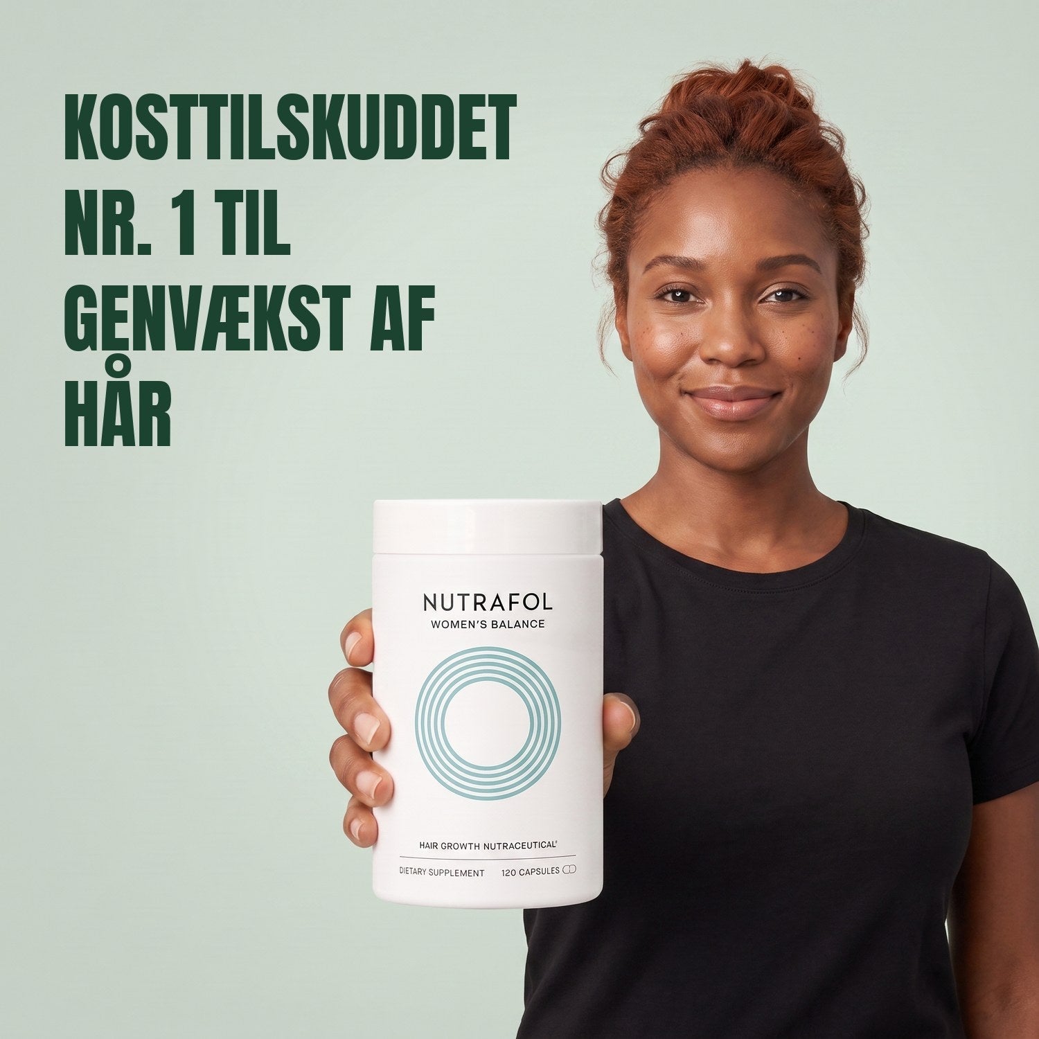 Woman holding the Nutrafol for Women 45+ supplement box against a green background