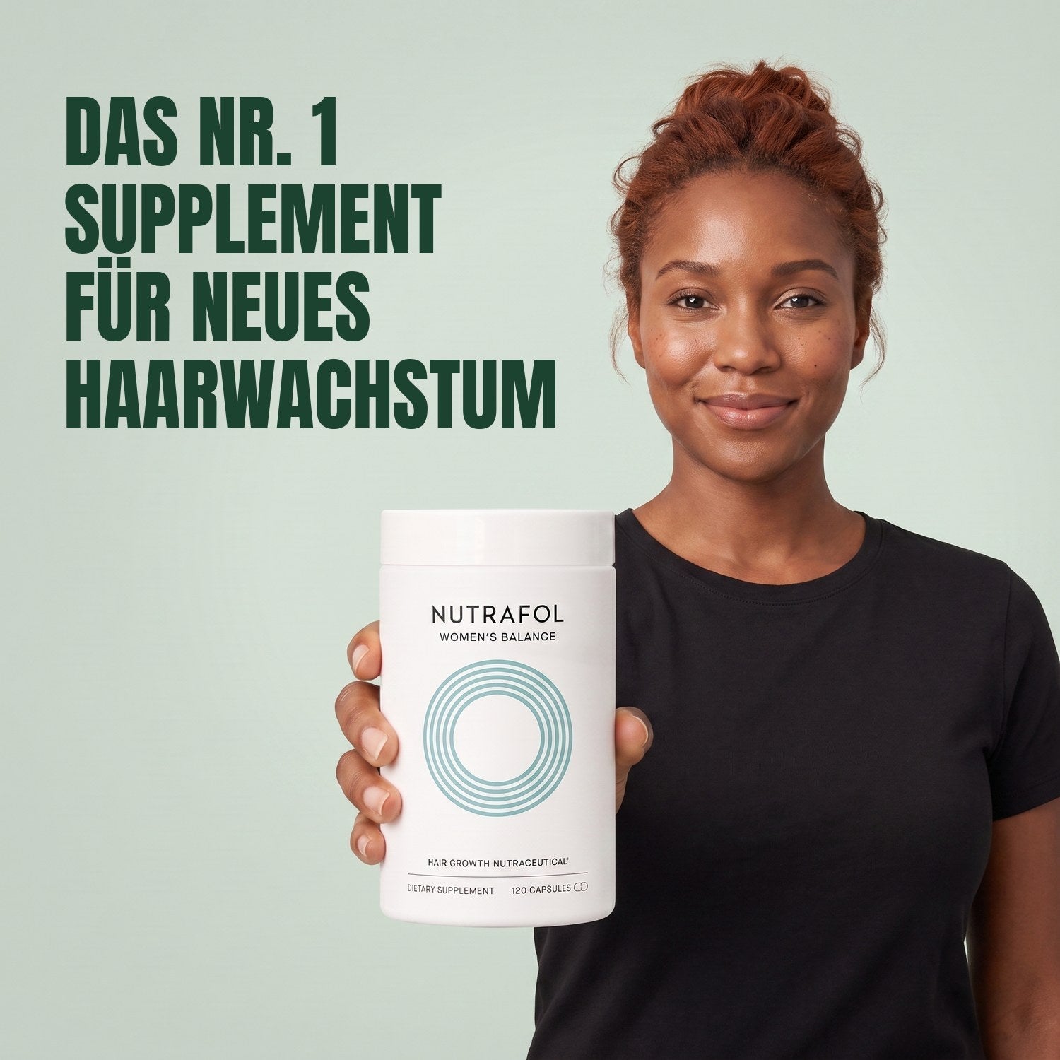 Woman holding the Nutrafol for Women 45+ supplement box against a green background