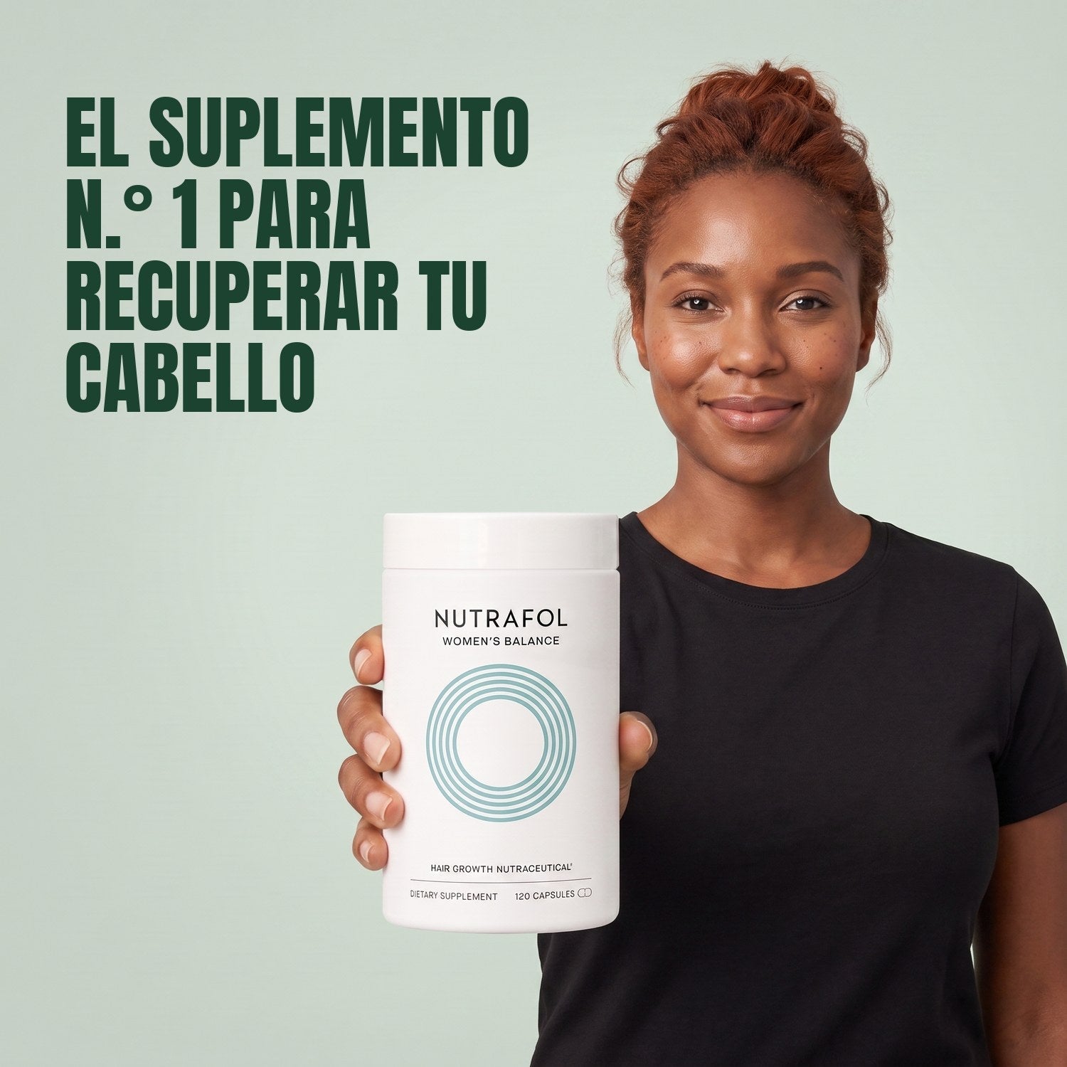 Woman holding the Nutrafol for Women 45+ supplement box against a green background