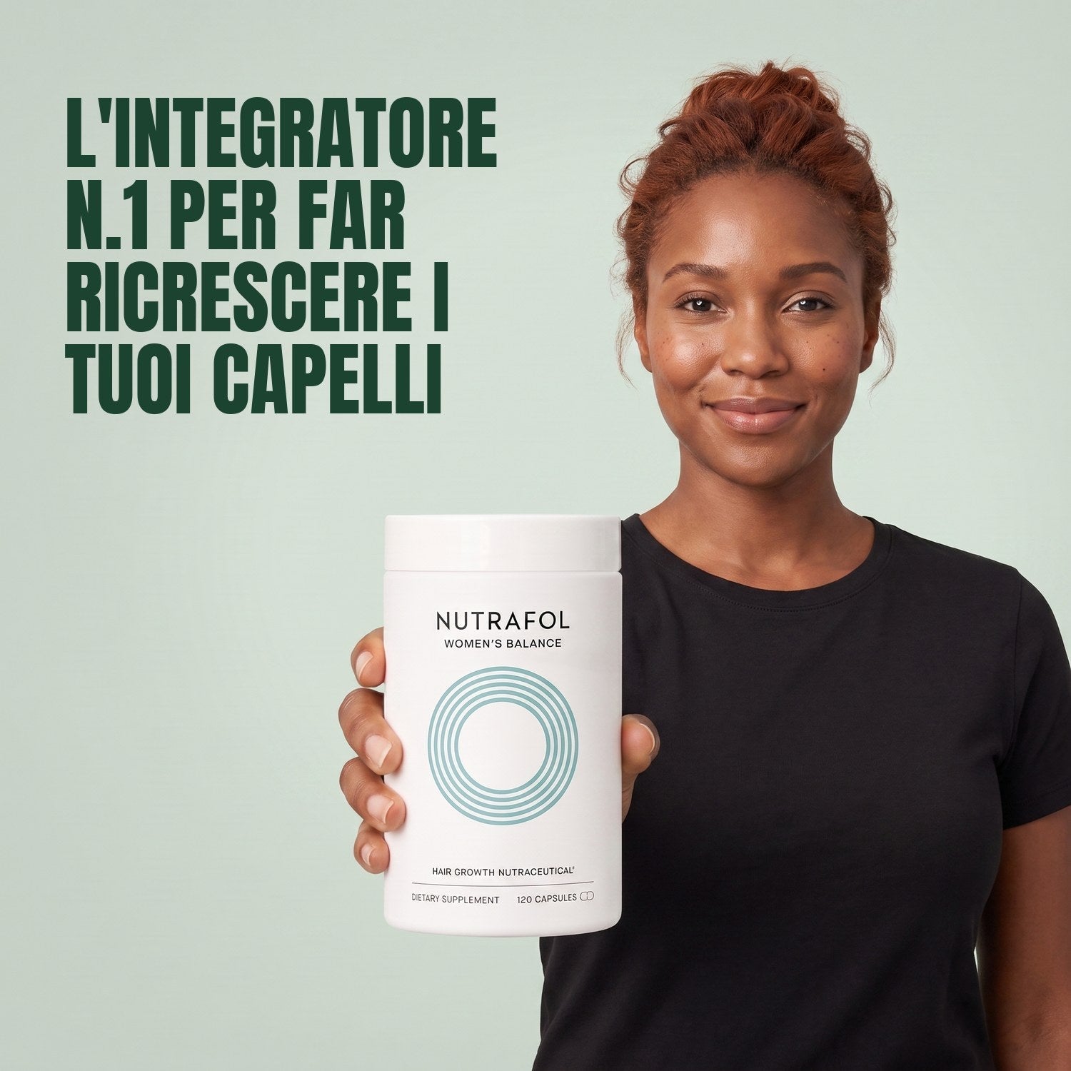 Woman holding the Nutrafol for Women 45+ supplement box against a green background