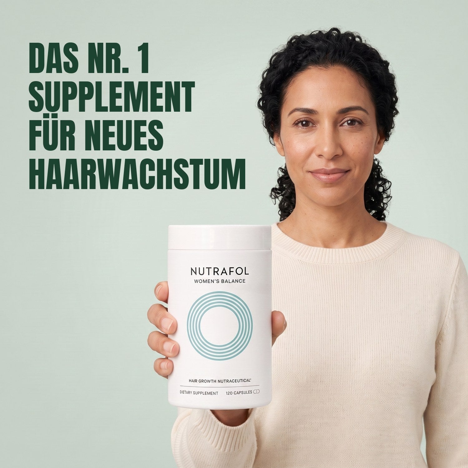 Woman holding the Nutrafol for Women 45+ supplement box against a green background