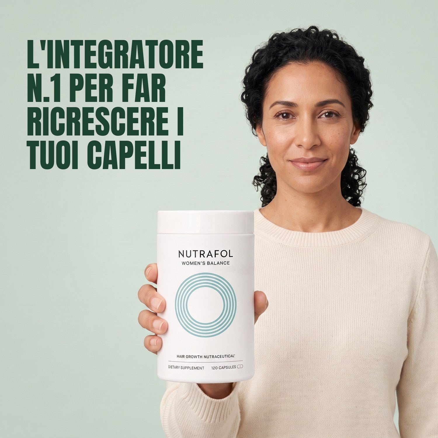 Woman holding the Nutrafol for Women 45+ supplement box against a green background
