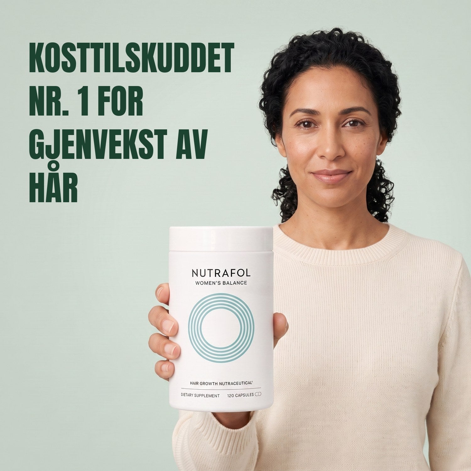 Woman holding the Nutrafol for Women 45+ supplement box against a green background