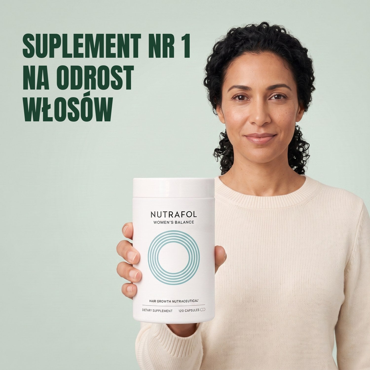 Woman holding the Nutrafol for Women 45+ supplement box against a green background