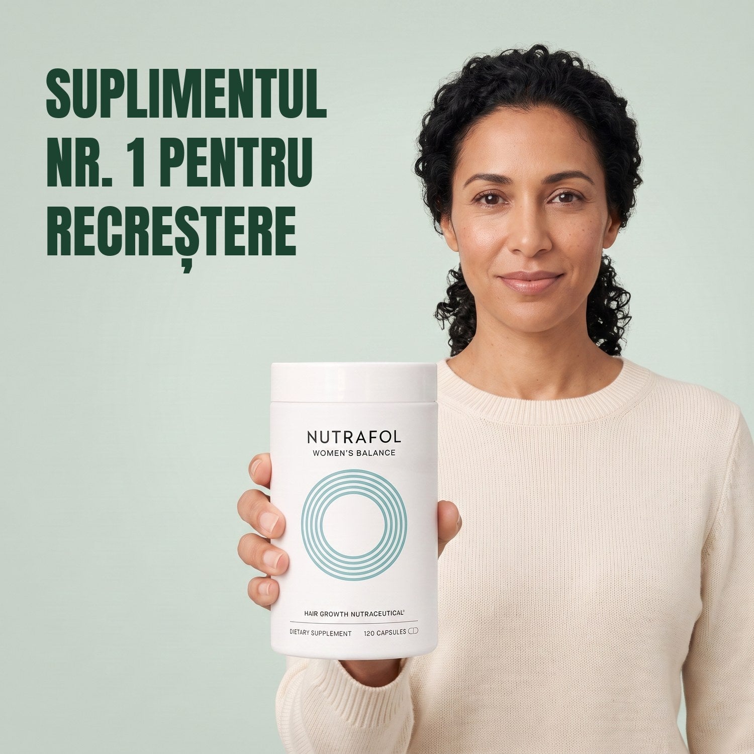 Woman holding the Nutrafol for Women 45+ supplement box against a green background